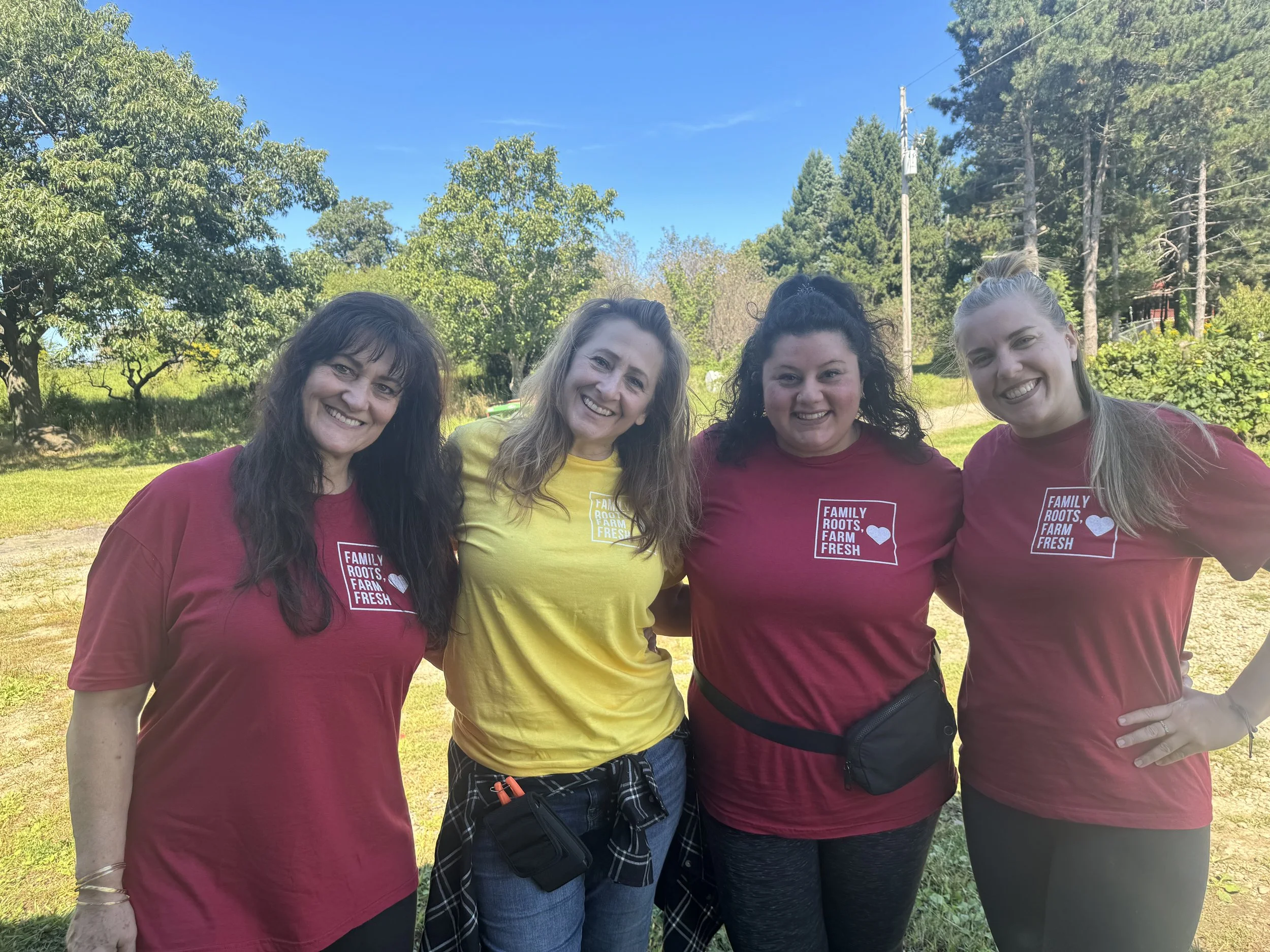 four women group portrait outdoor.jpeg
