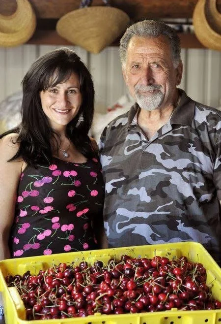 Wajeeh Rahal, founder of Rahal Farms, sharing the farm harvest with family.