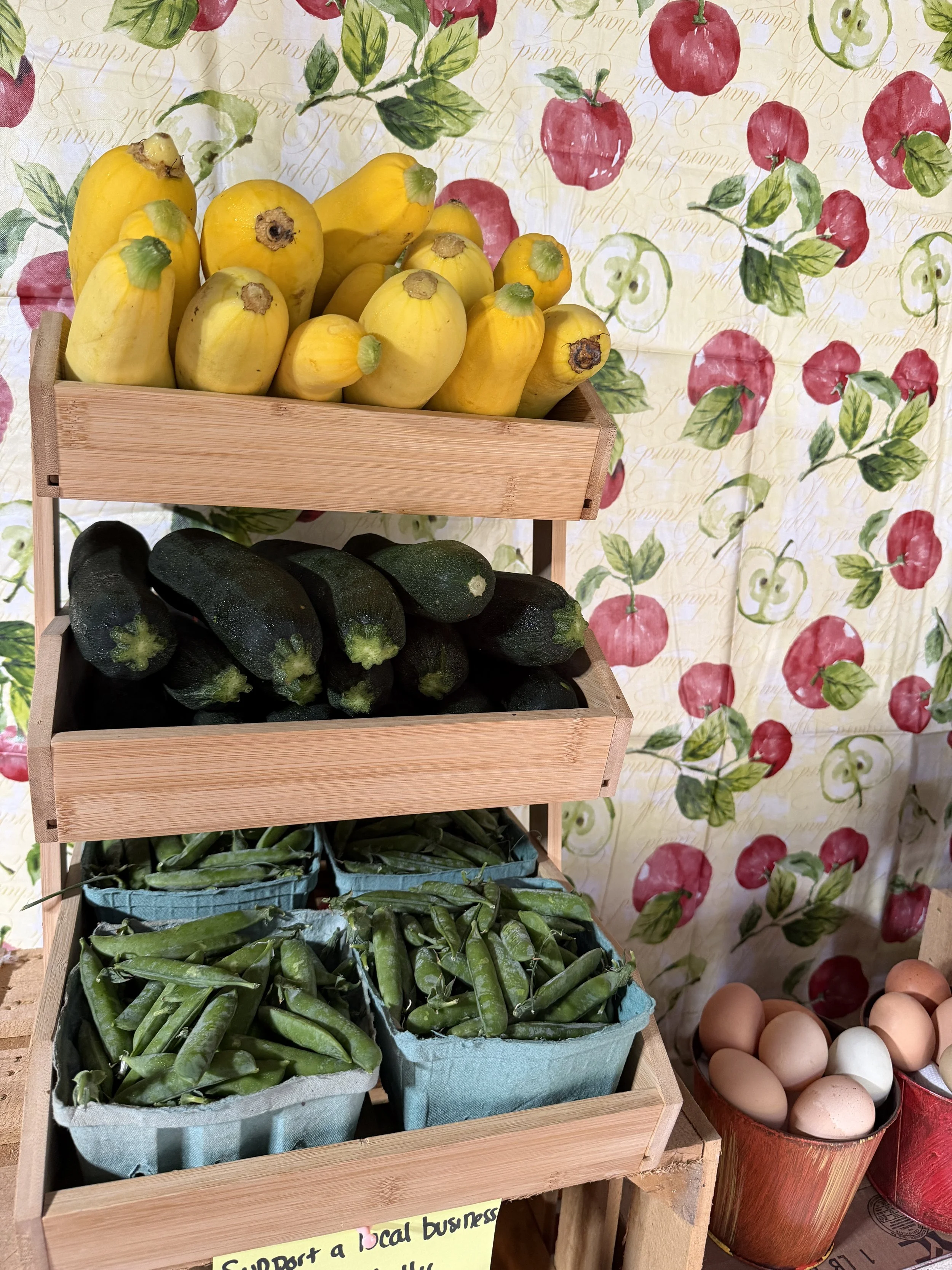 fresh vegetables on wooden crate display.jpeg