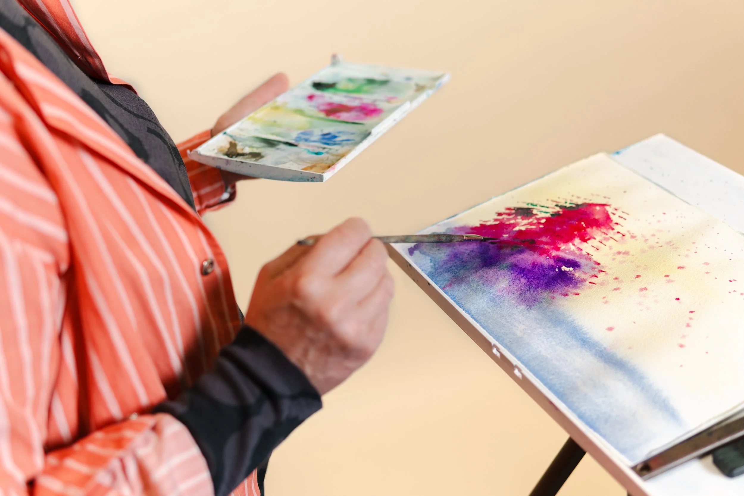 Pirjo Leskinen paints watercolor photographed by Karoliina Gavrilov