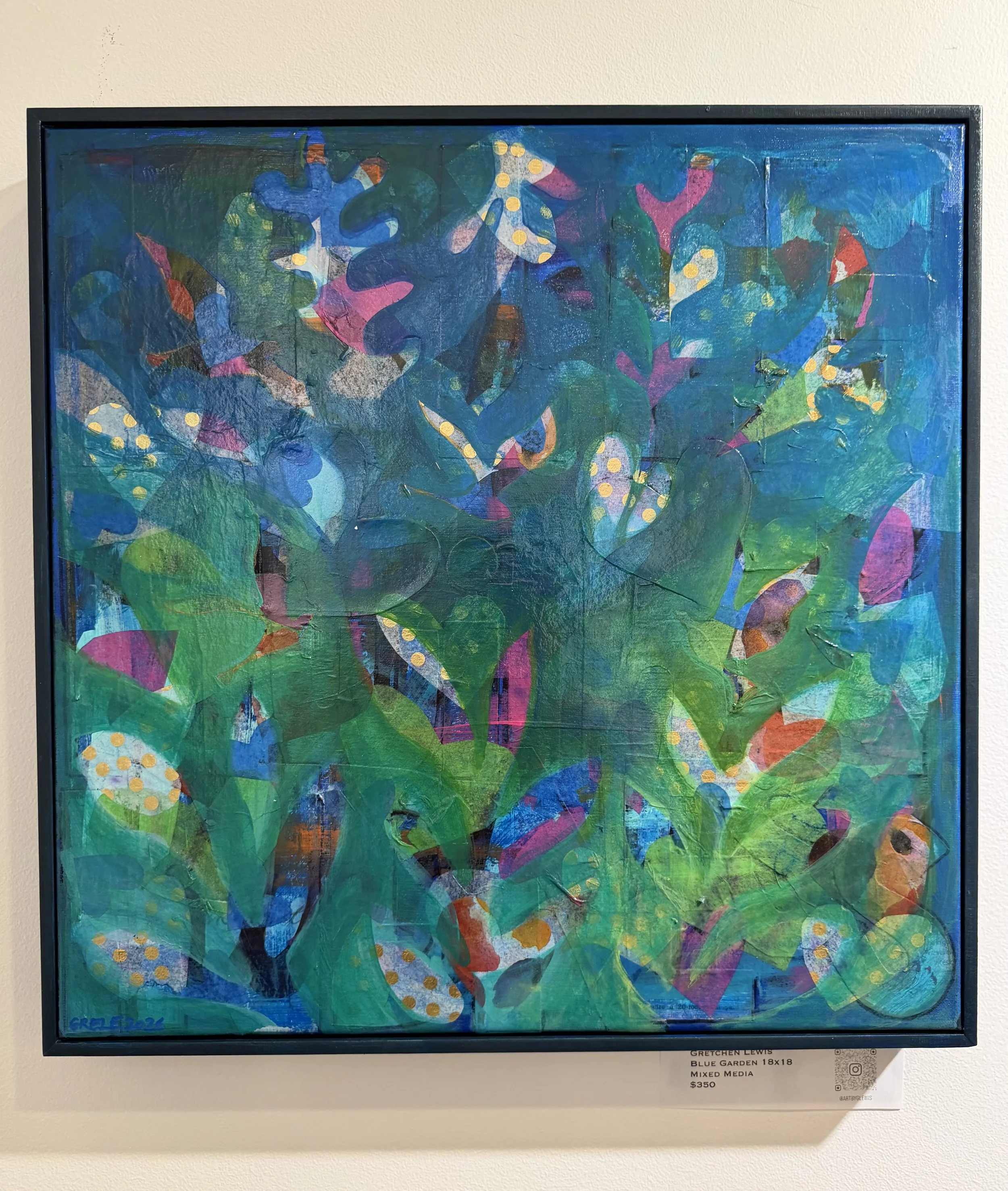 Abstract mixed media painting titled 'Blue Garden' by Gretchen Lewis. The artwork features vibrant, overlapping shapes and brushstrokes in shades of blue, green, pink, purple, and orange, with dotted accents, within a black frame.