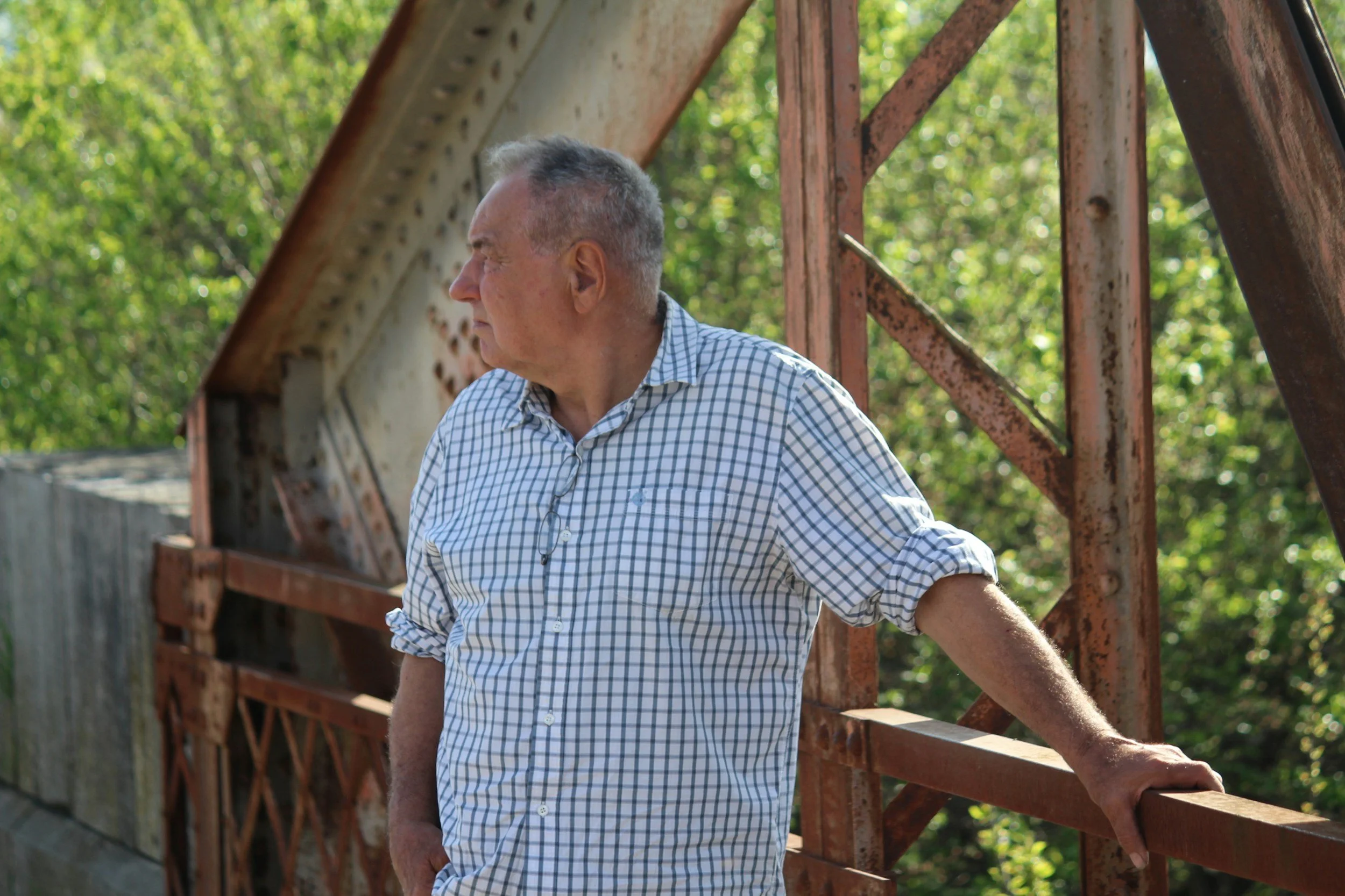 Man in a shirt representing professional care leadership and support