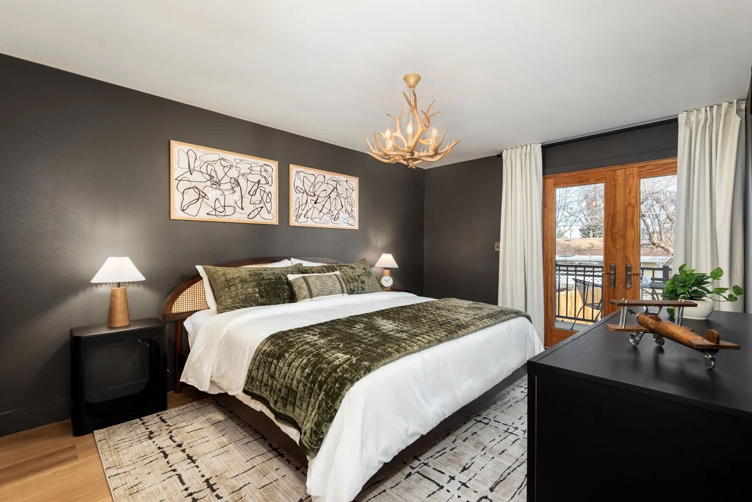 Guest bedroom in a short-term rental designed by Mo'ed Interior Design
