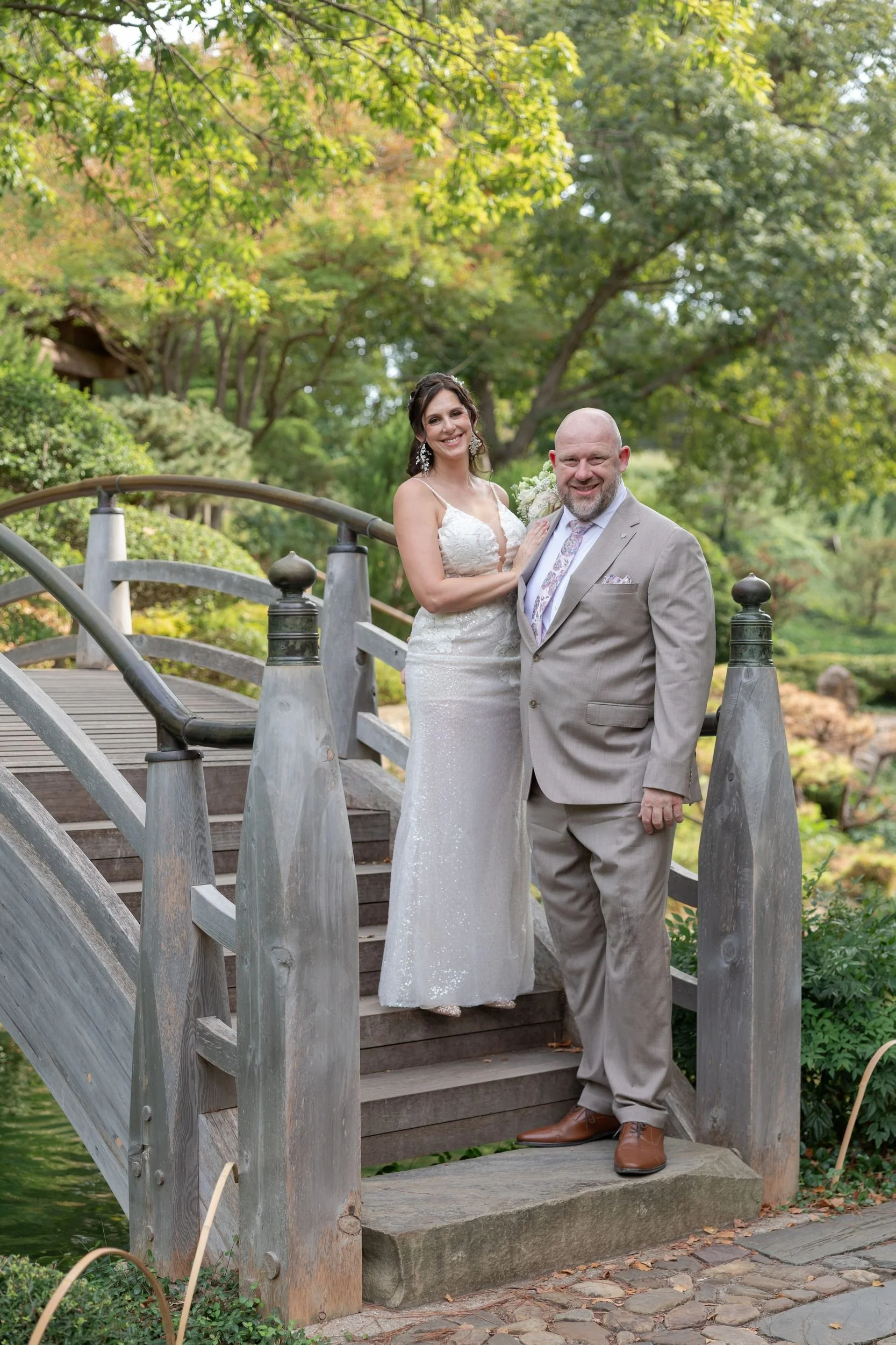 Lydia and Ryan on the steps of a garden bridge, Fort Worth wedding photography