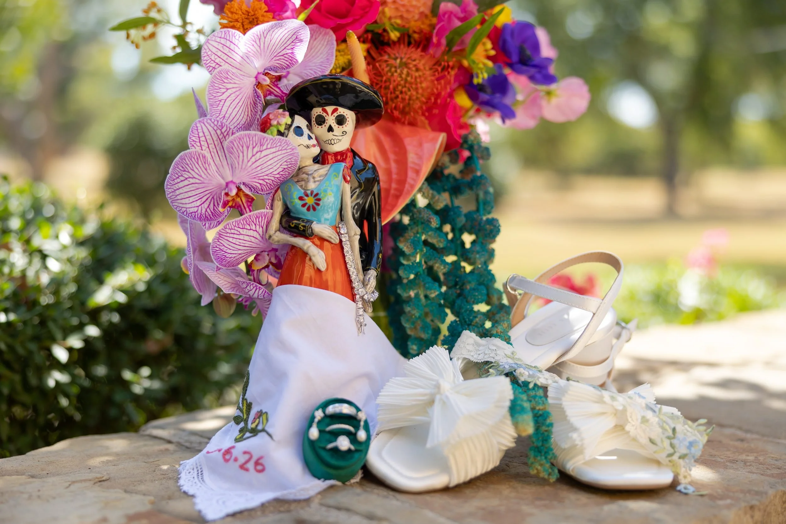 Colorful bouquet, shoes and wedding details for Carita and Miguel's Azle wedding