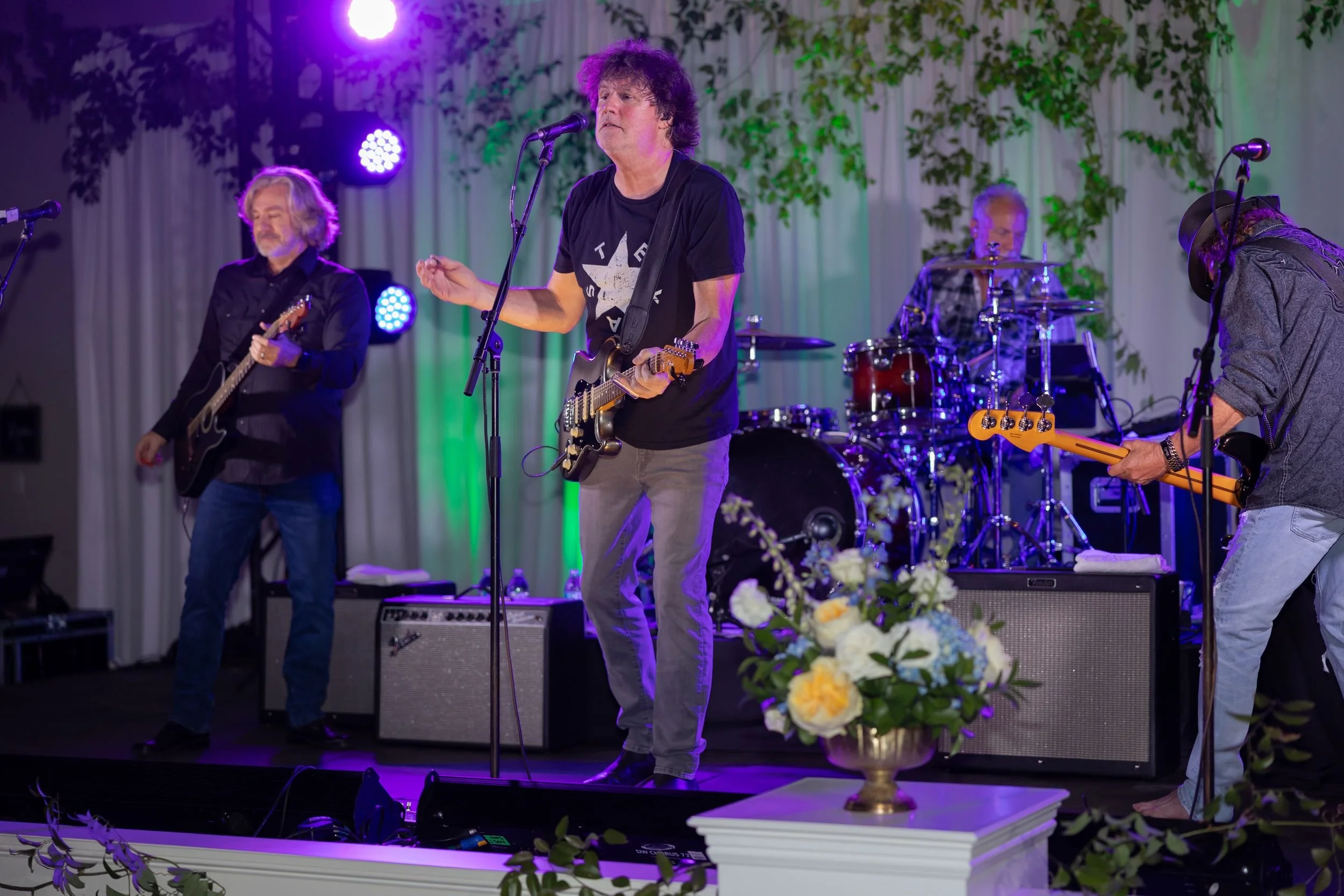 Live band on stage at Lacey and Jason's reception at Dove Ridge Vineyard