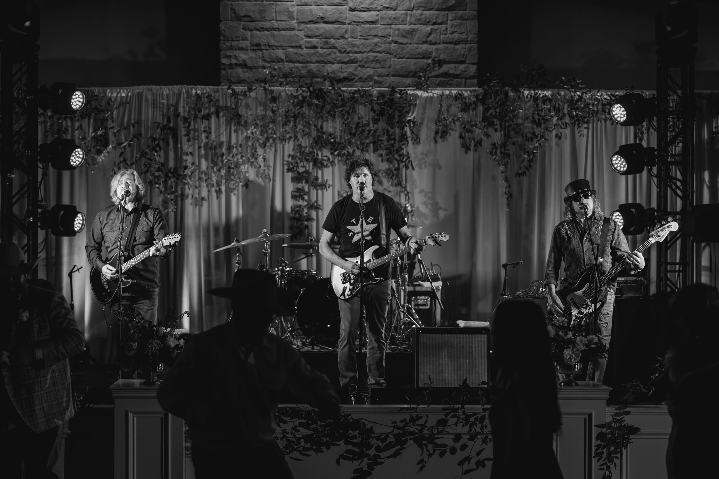 Black-and-white photo of the live band performing at Lacey and Jason's reception