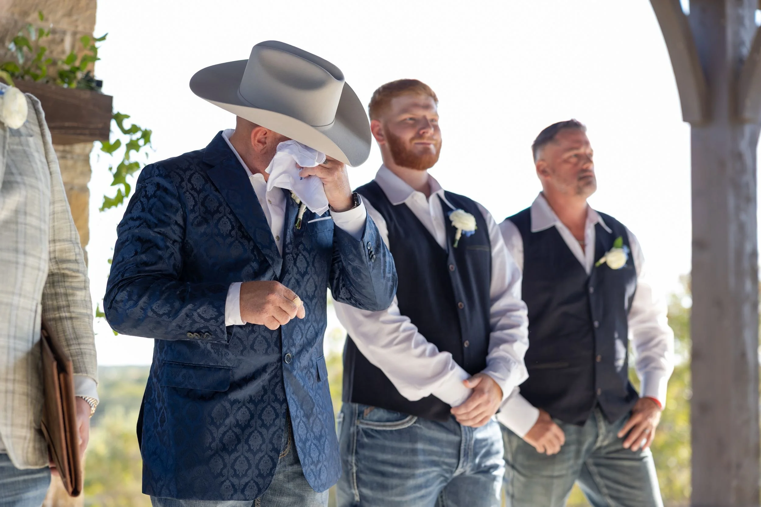 Groom reacting as the bride walks down the aisle at Dove Ridge Vineyard