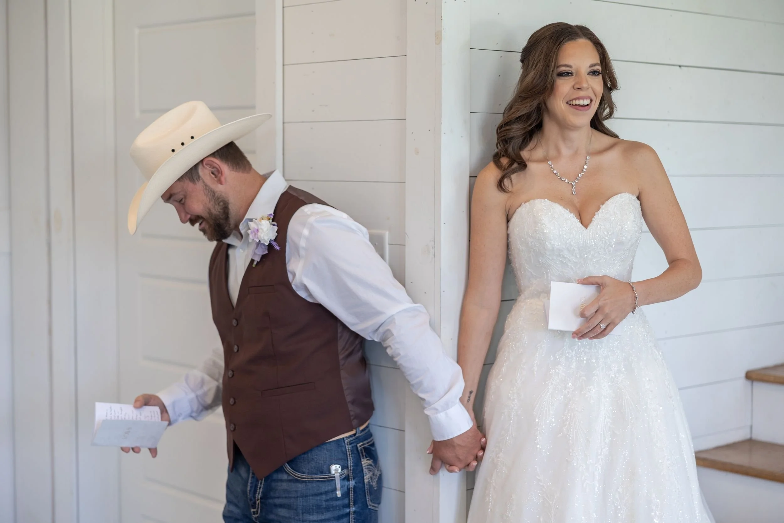 Heather and Geffrey reading letters to each other before their Weatherford wedding ceremony