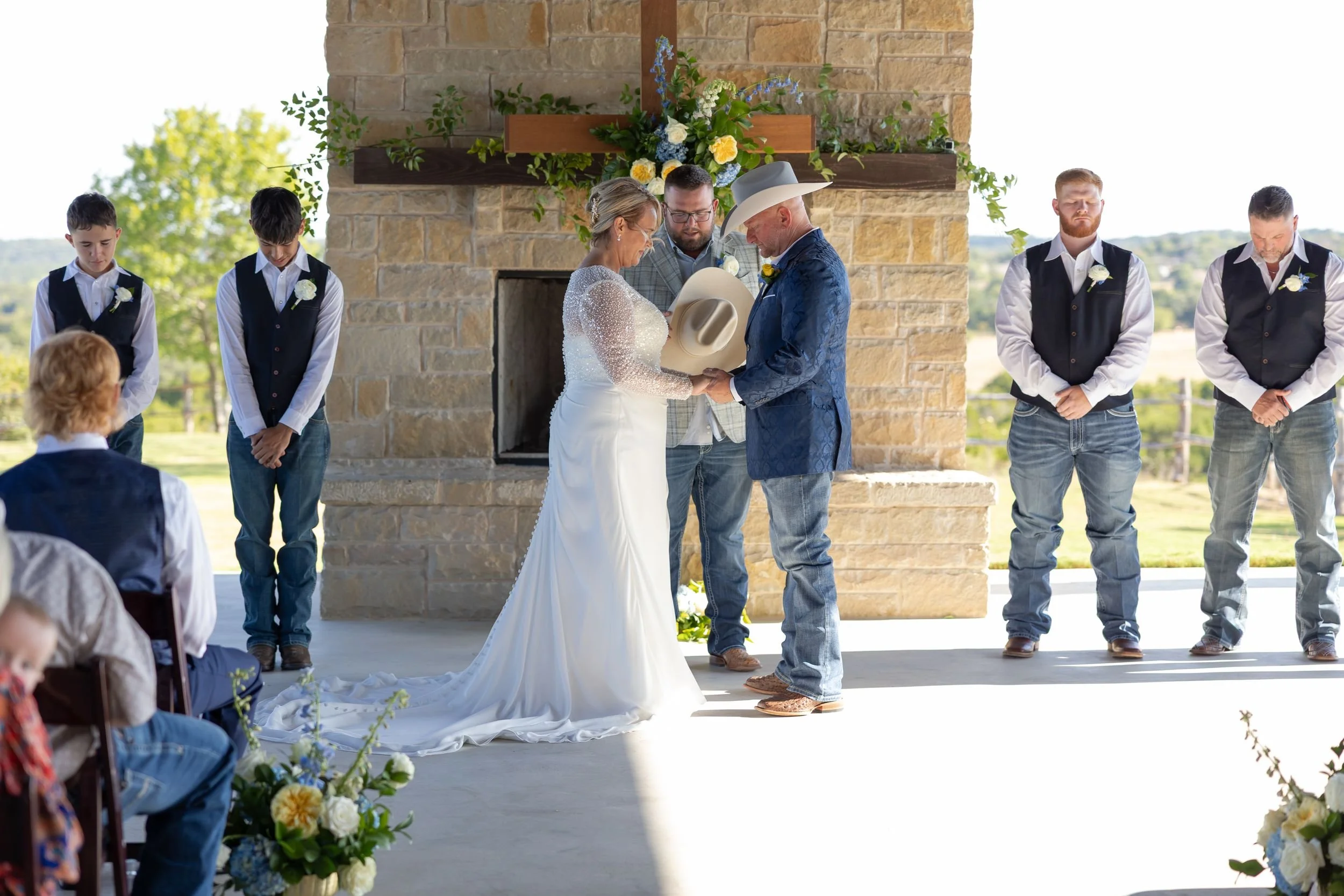 Outdoor wedding ceremony under the pavilion at Dove Ridge Vineyard in Weatherford, Texas