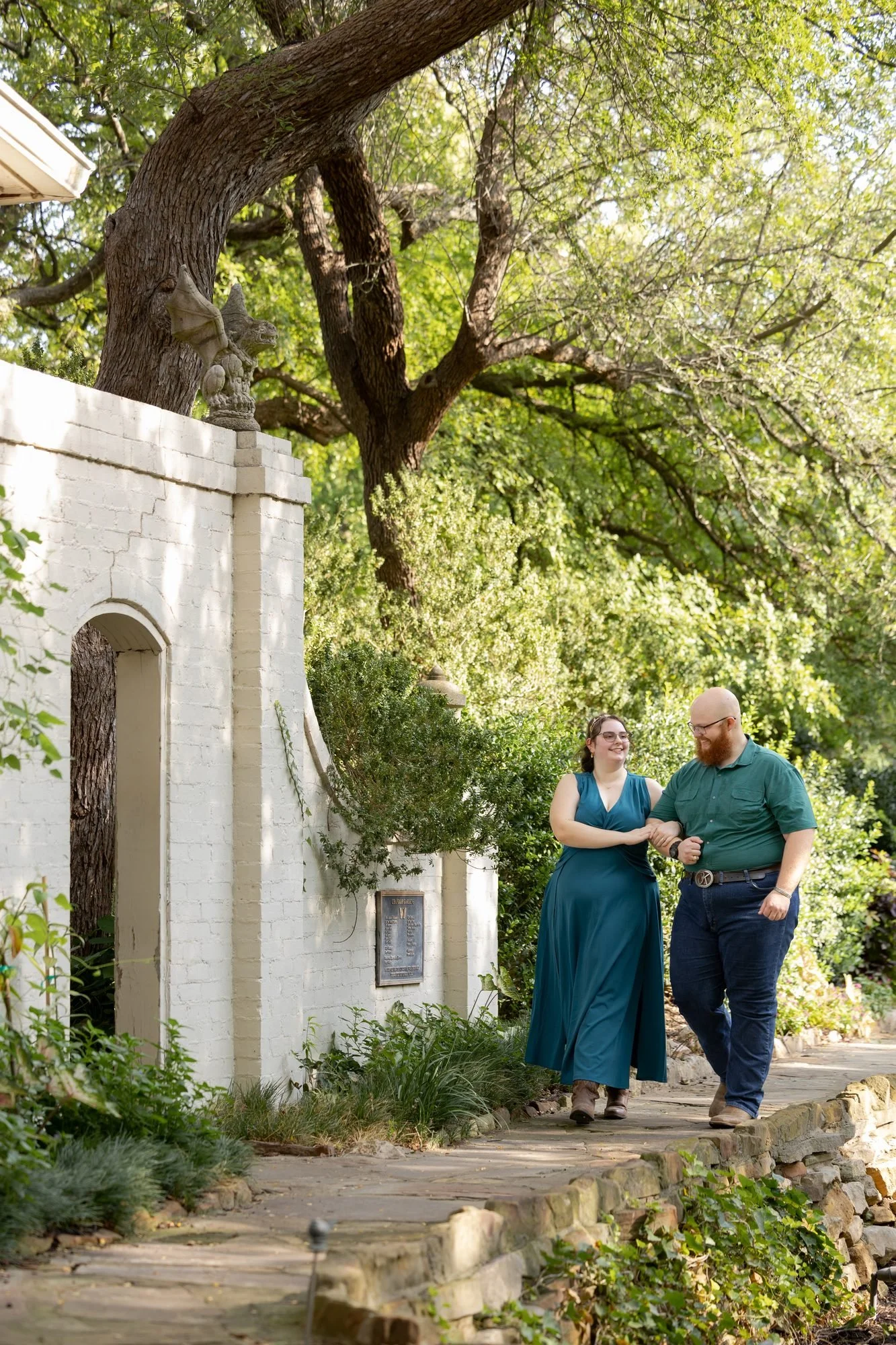 engagement-couple-walking-garden-path-dfw.jpg