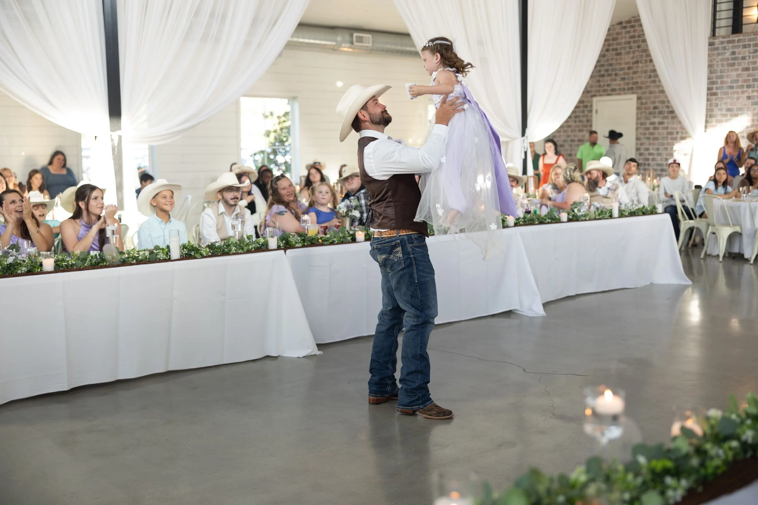 Groom giving a toast at the reception in The Barn at Paradise Place