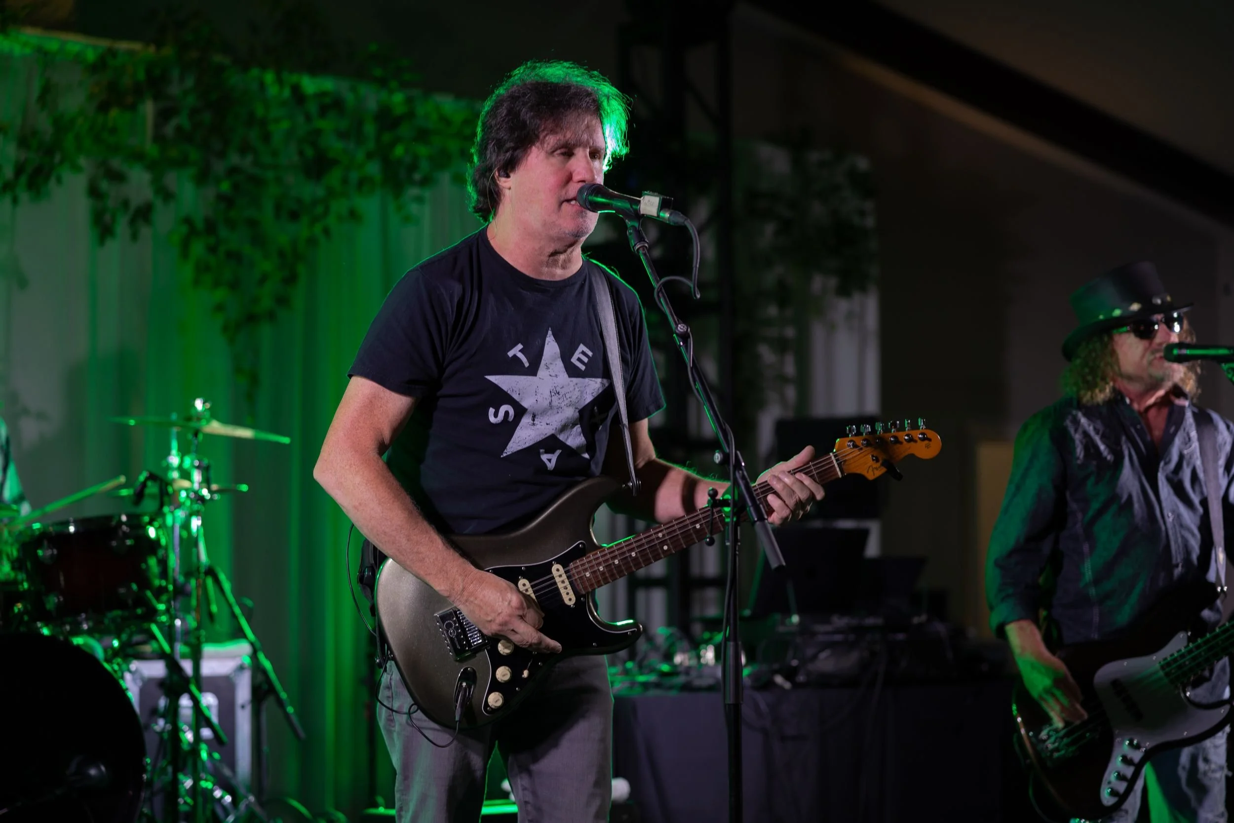 Guitarist performing with the live band at a Weatherford wedding reception