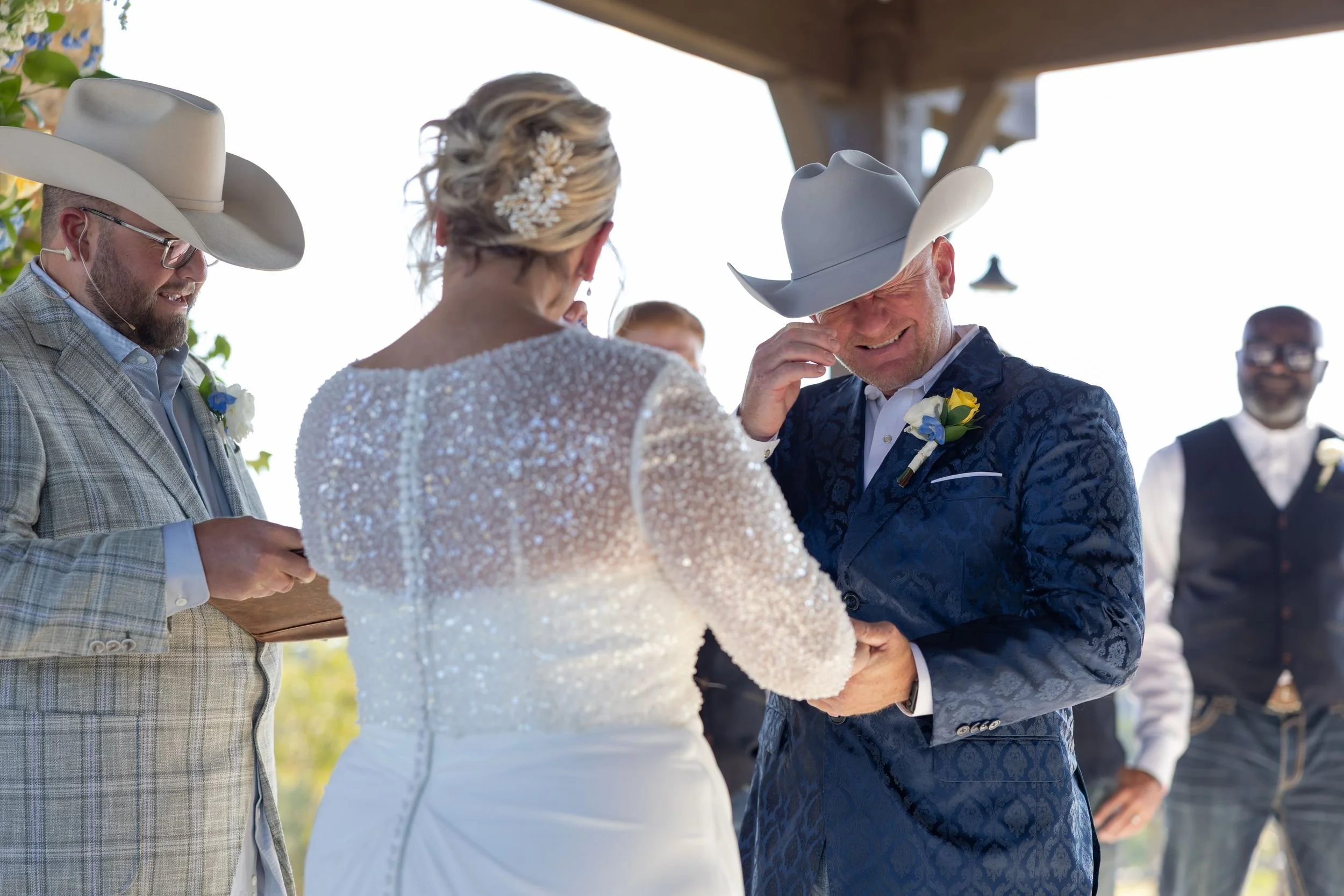 Bride and groom greeting family at the ceremony at Dove Ridge Vineyard