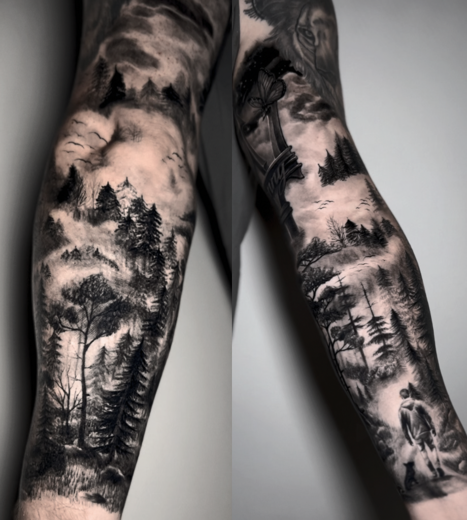 Black and gray landscape tattoo featuring trees, mountains, and clouds on a person's arm.