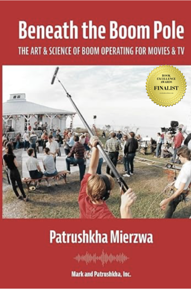 Book cover titled 'Beneath the Boom Pole: The Art & Science of Boom Operating for Movies & TV' by Patrushkha Mierzwa, showing a crowd at an outdoor event with a person holding a boom microphone in the foreground.