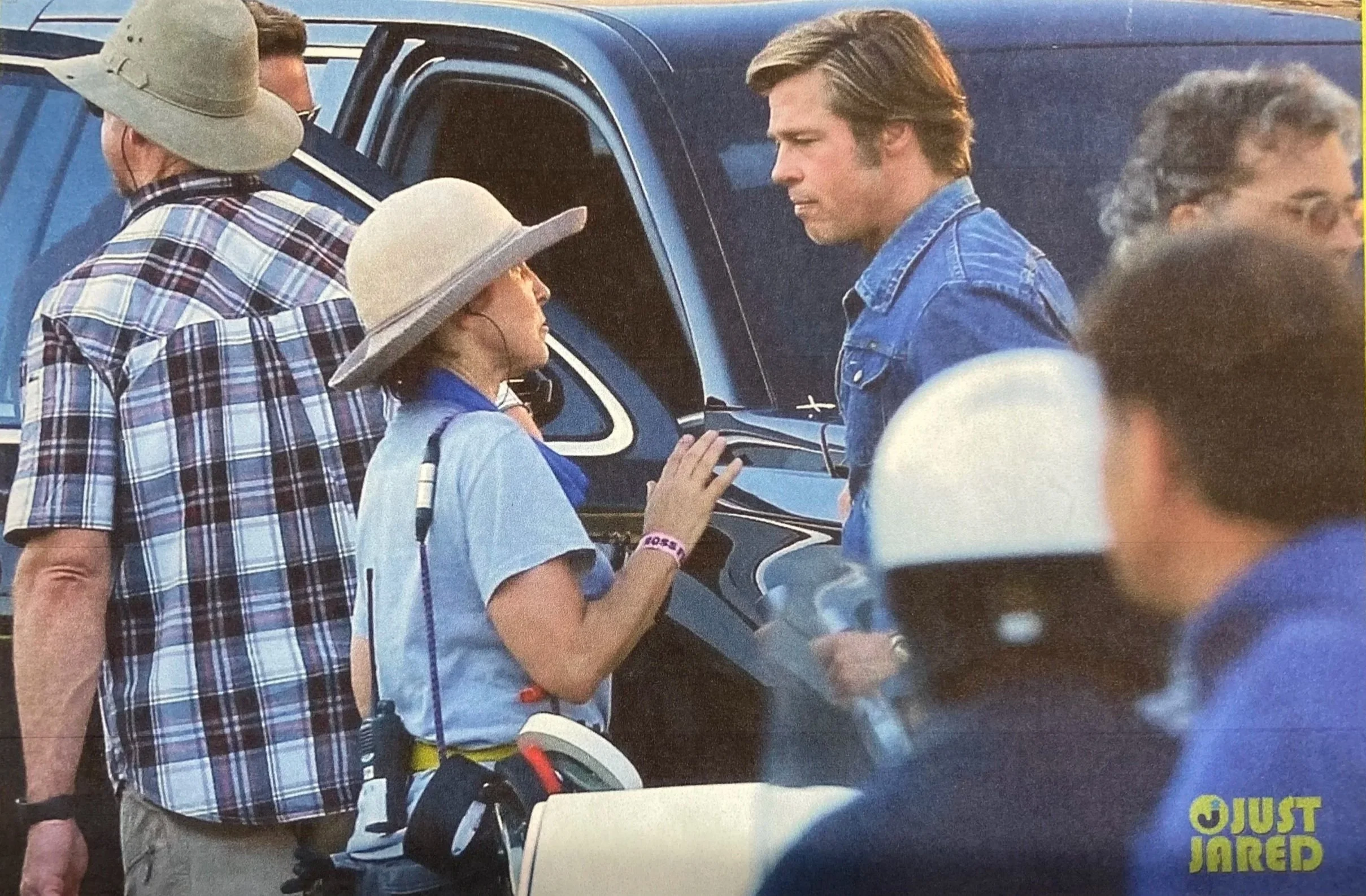 Patrushkha putting a boom mike on Brad Pitt on the set of AD ASTRA.