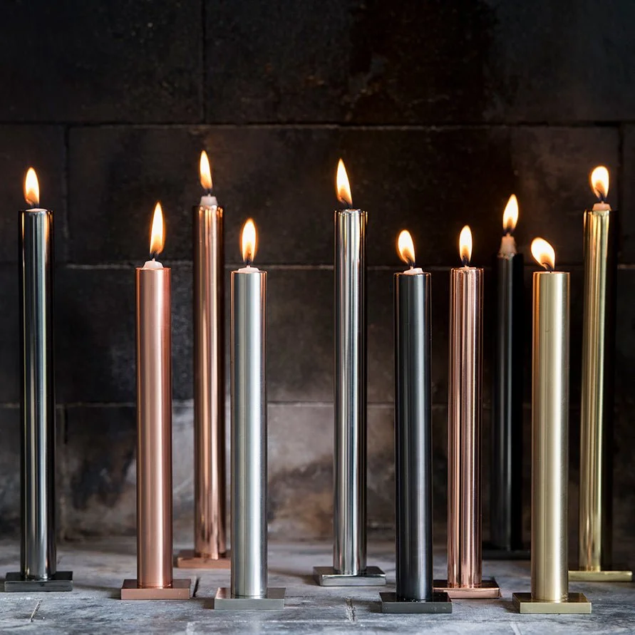 Hypsoé Still Table Candlesticks, Black, styled in a room