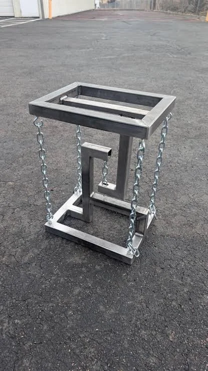 Metal frame and chains structure to create a unique table.