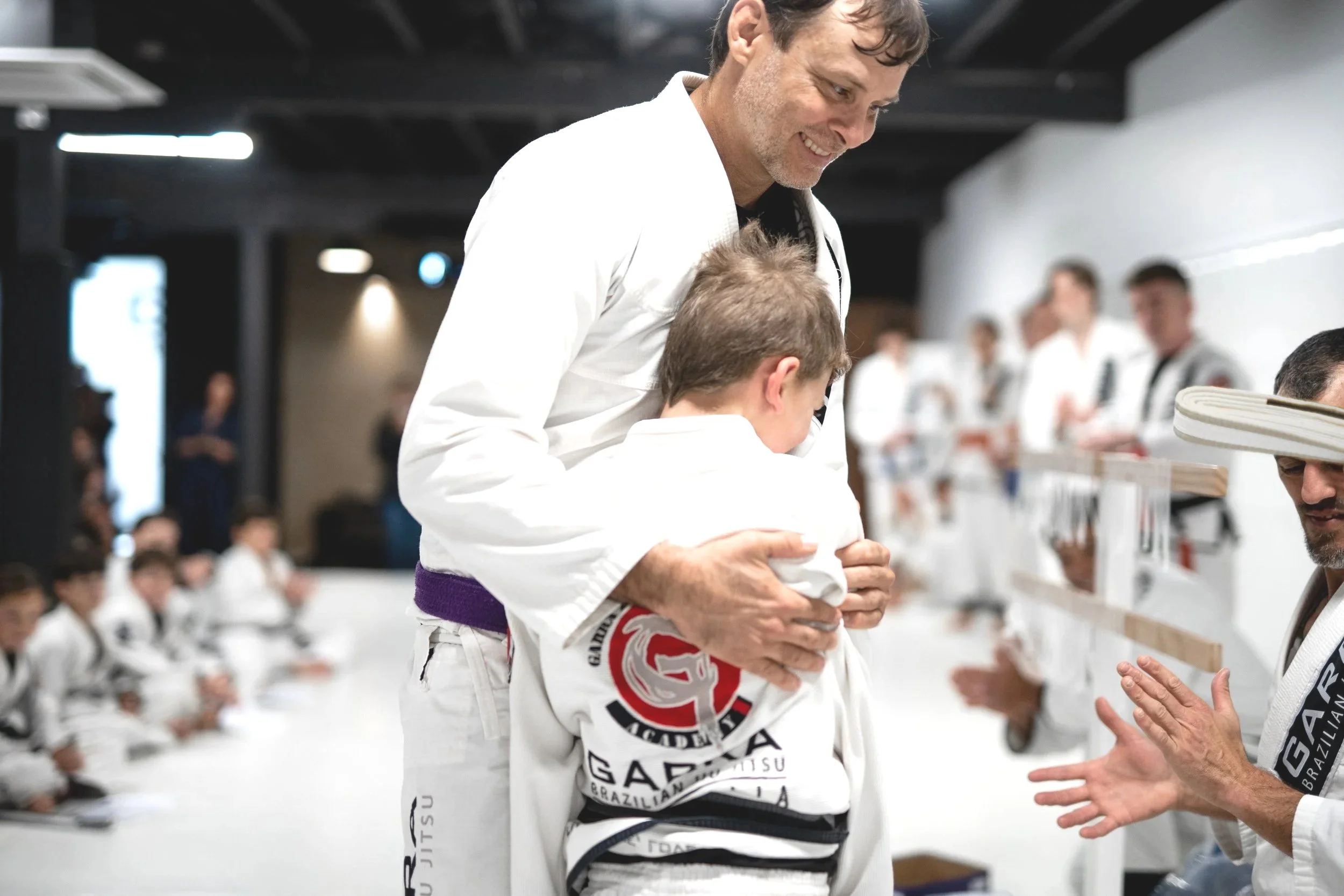 He talks about his kids the way he coaches — with patience, pride, and a genuine interest in who they're becoming.
