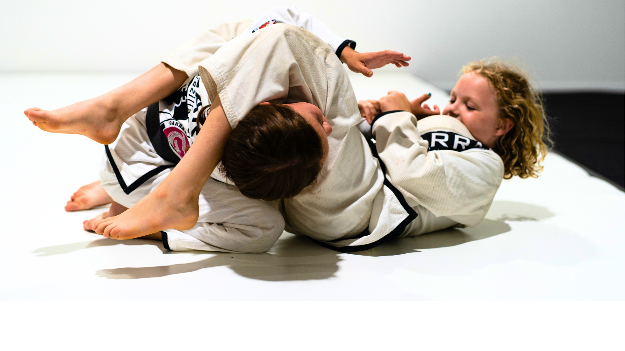 Kids who train together learn something that's hard to teach any other way. They learn how to work with someone, how to be patient with a partner who's struggling, and how to celebrate someone else's progress as much as their own.