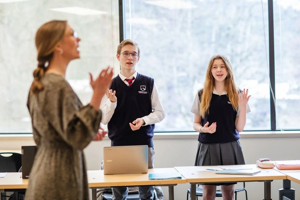 A Summit teacher leading an Upper School clas