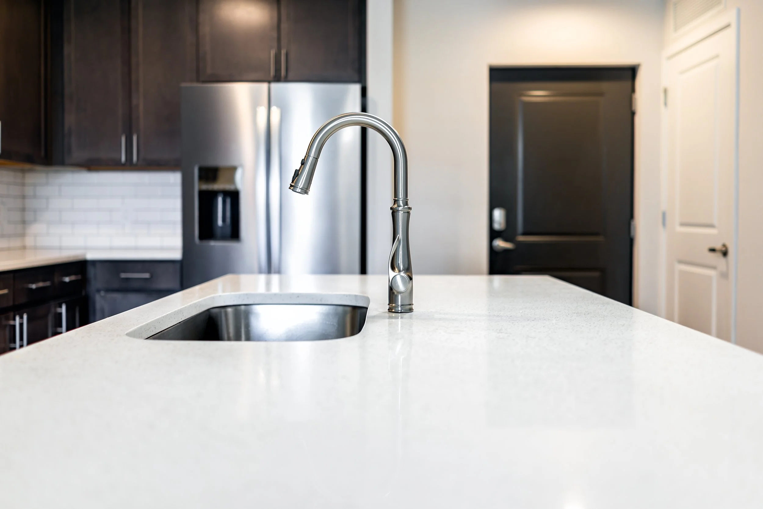 quartz countertop surface island in modern home.