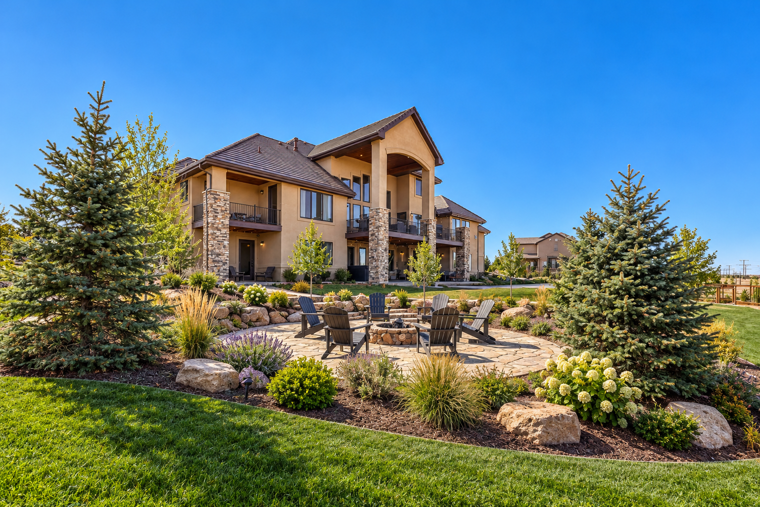 Luxury home with landscaped fire pit yard