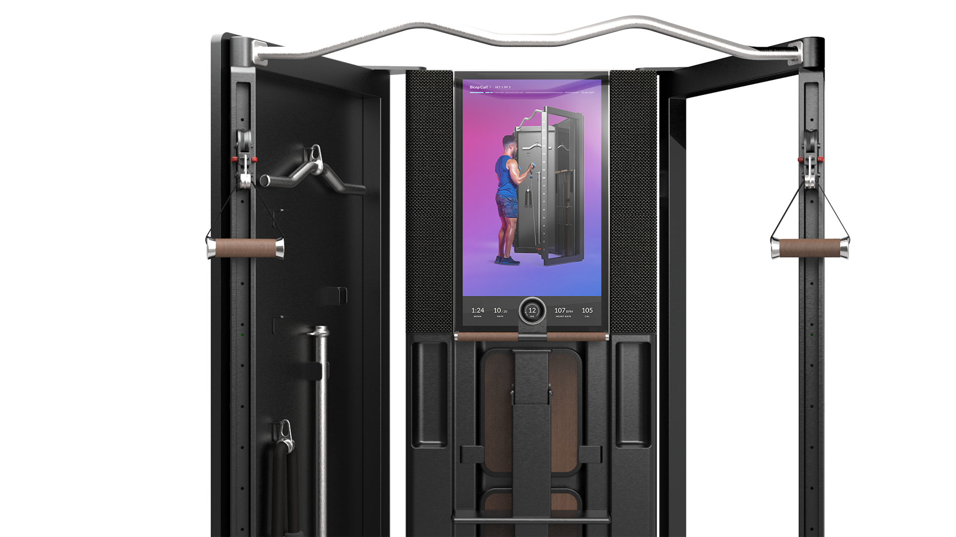 A modern fitness machine with various exercise attachments, a digital display showing a man using the machine, and side handles with brown grips for workout exercises.