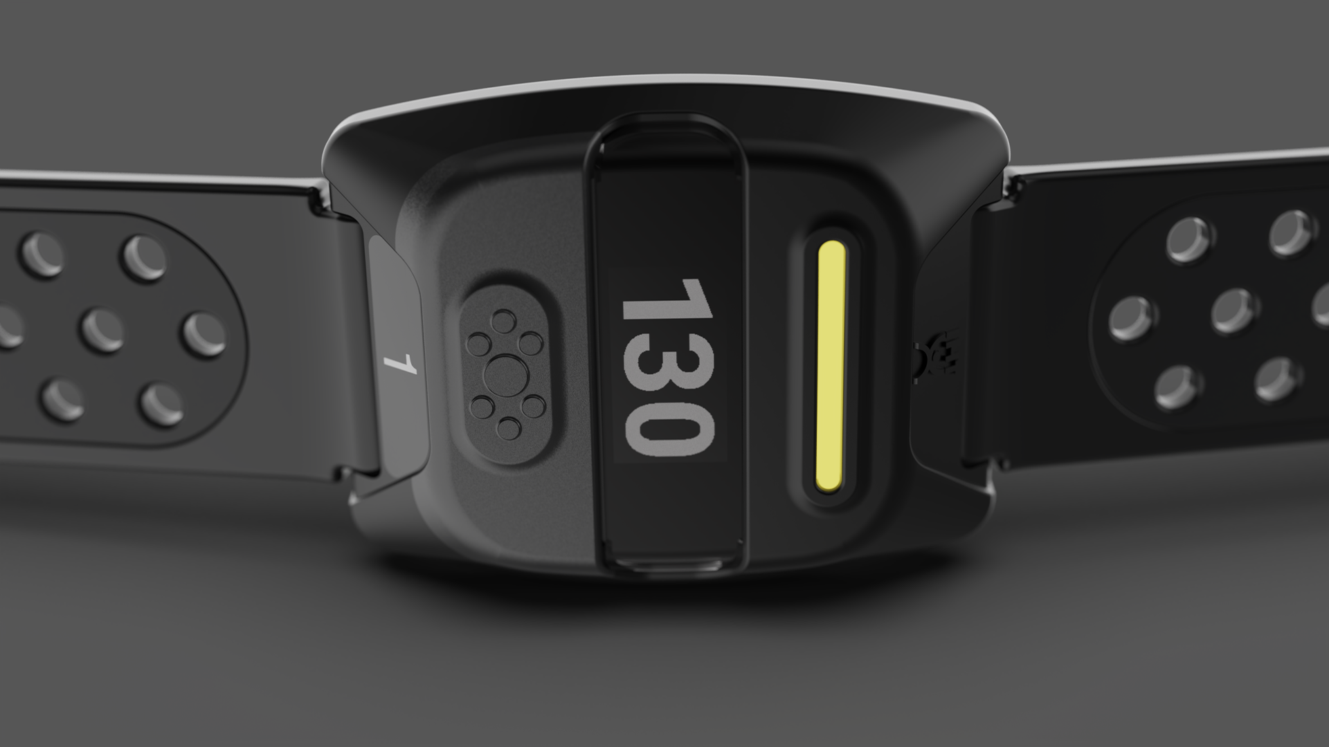 A close-up of a black fitness tracker or smartwatch with a yellow LED indicator and various small details on its band and body.