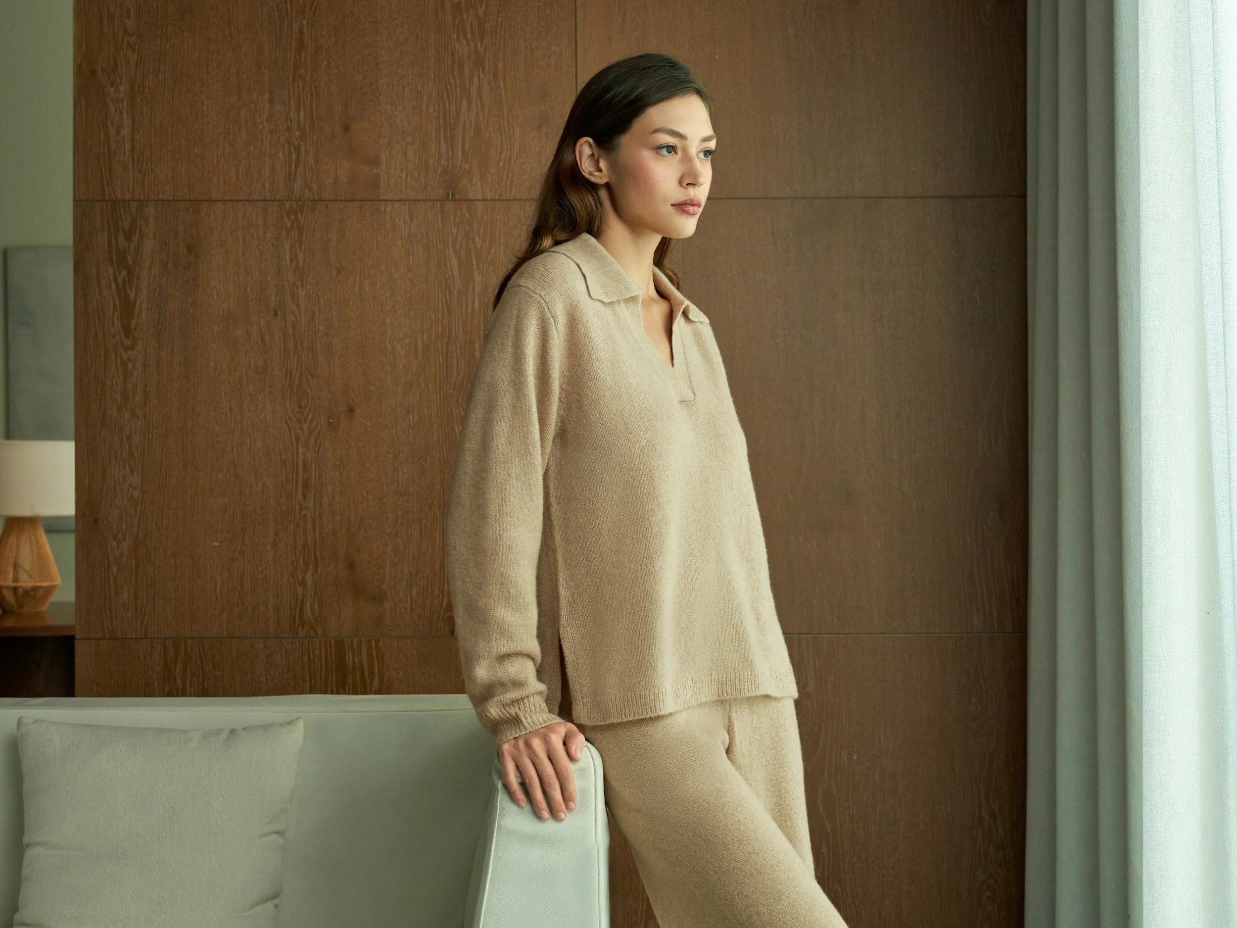 Woman in a beige knit set