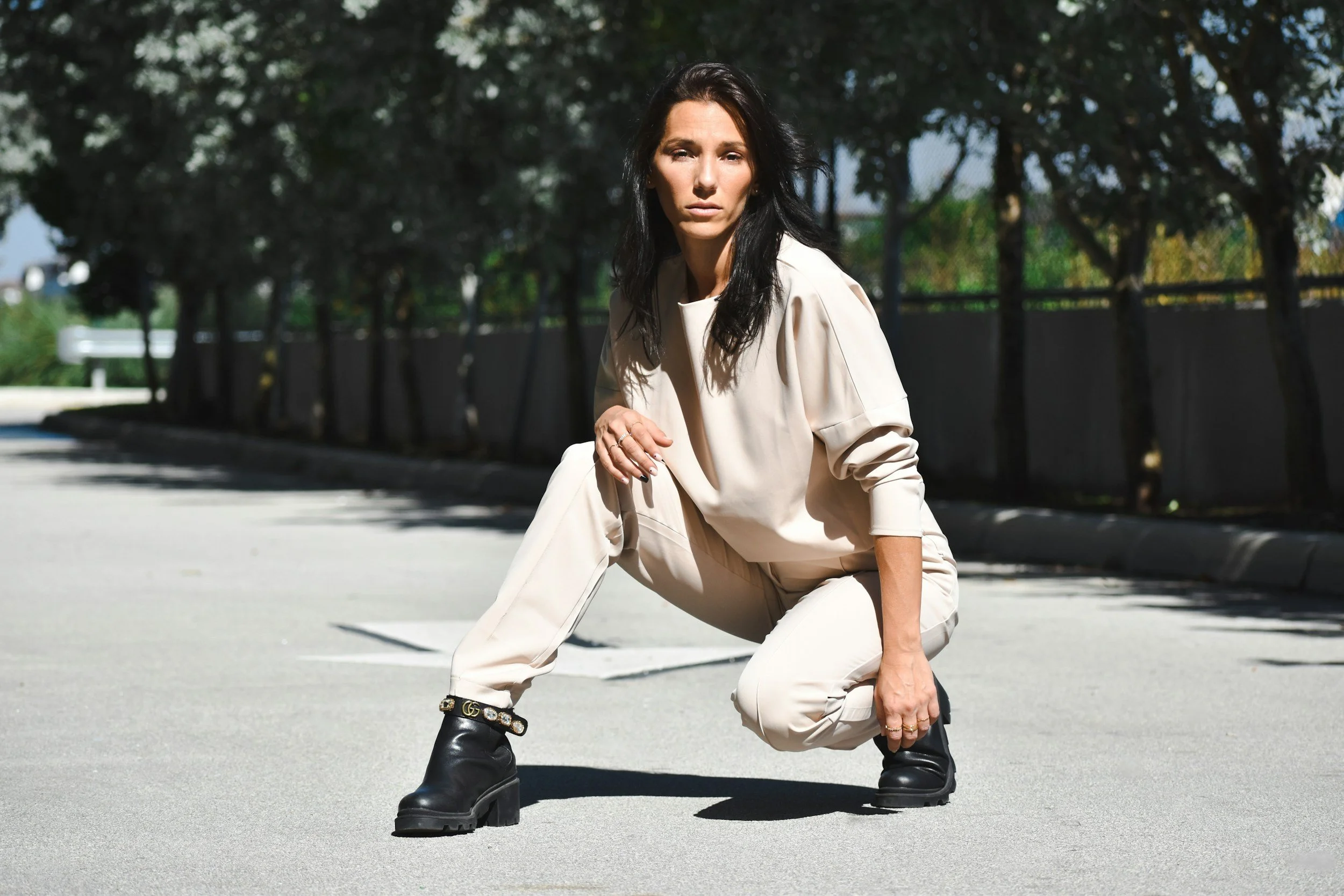 Woman in a beige lounge and activewear set