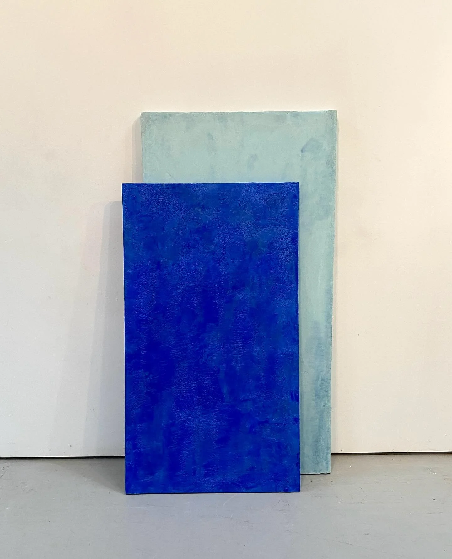 Raining in The Park, For Jimmy. 2026, 70.5x40x16 inches, pigmented plaster, encaustic, wood, (2 elements). 
“between earth and sky”