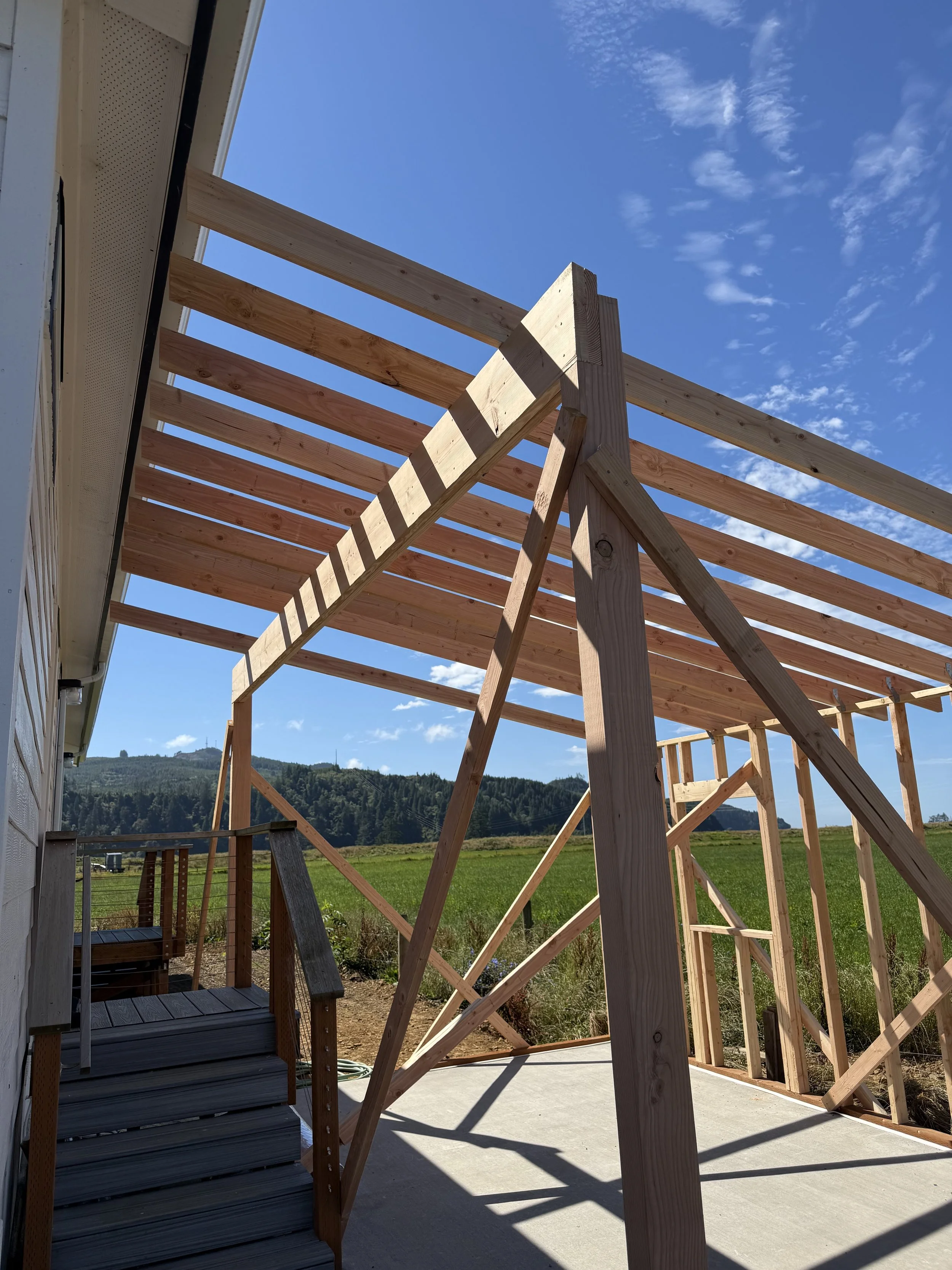 Oranssi technician working on a roof project