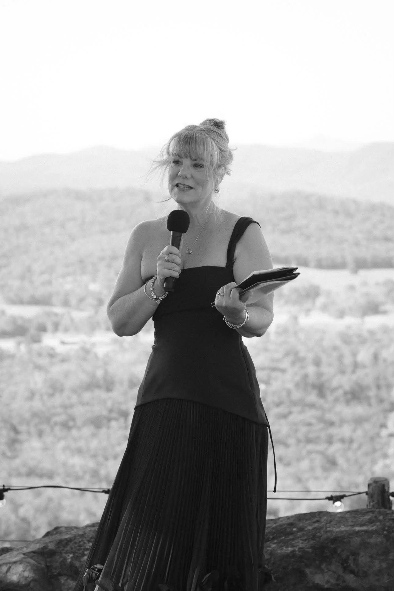 Authorised Marriage Celebrant Tracey Quinn conducting an outdoor wedding ceremony on Queensland's Capricorn Coast.