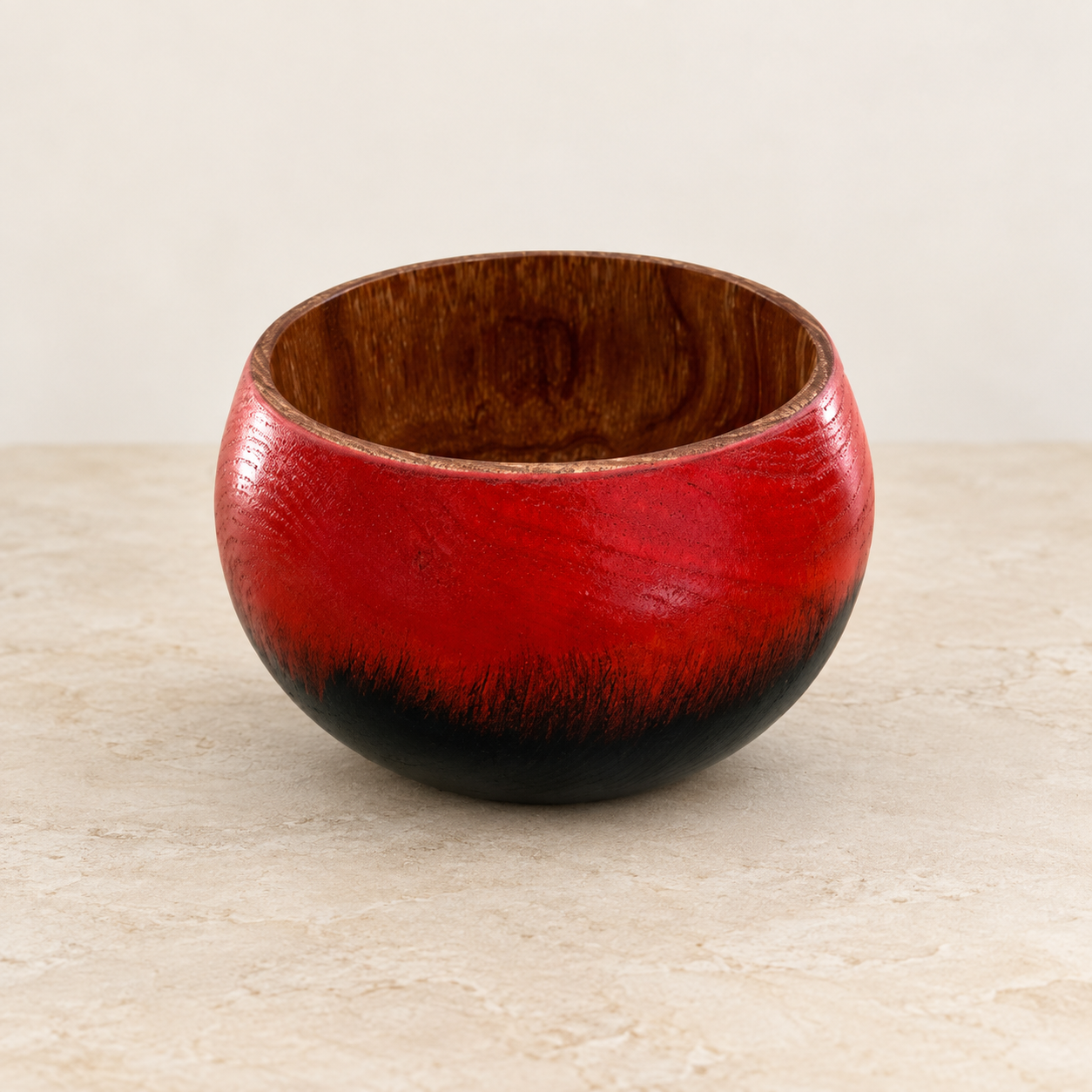 Hand-turned Silky Oak bowl with red and black exterior and natural timber interior