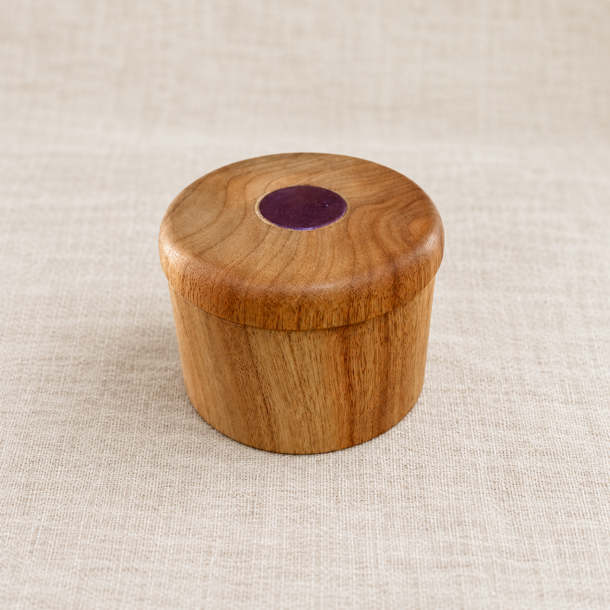Hand-turned Camphor Laurel trinket box with red chameleon colour-shift lid insert
