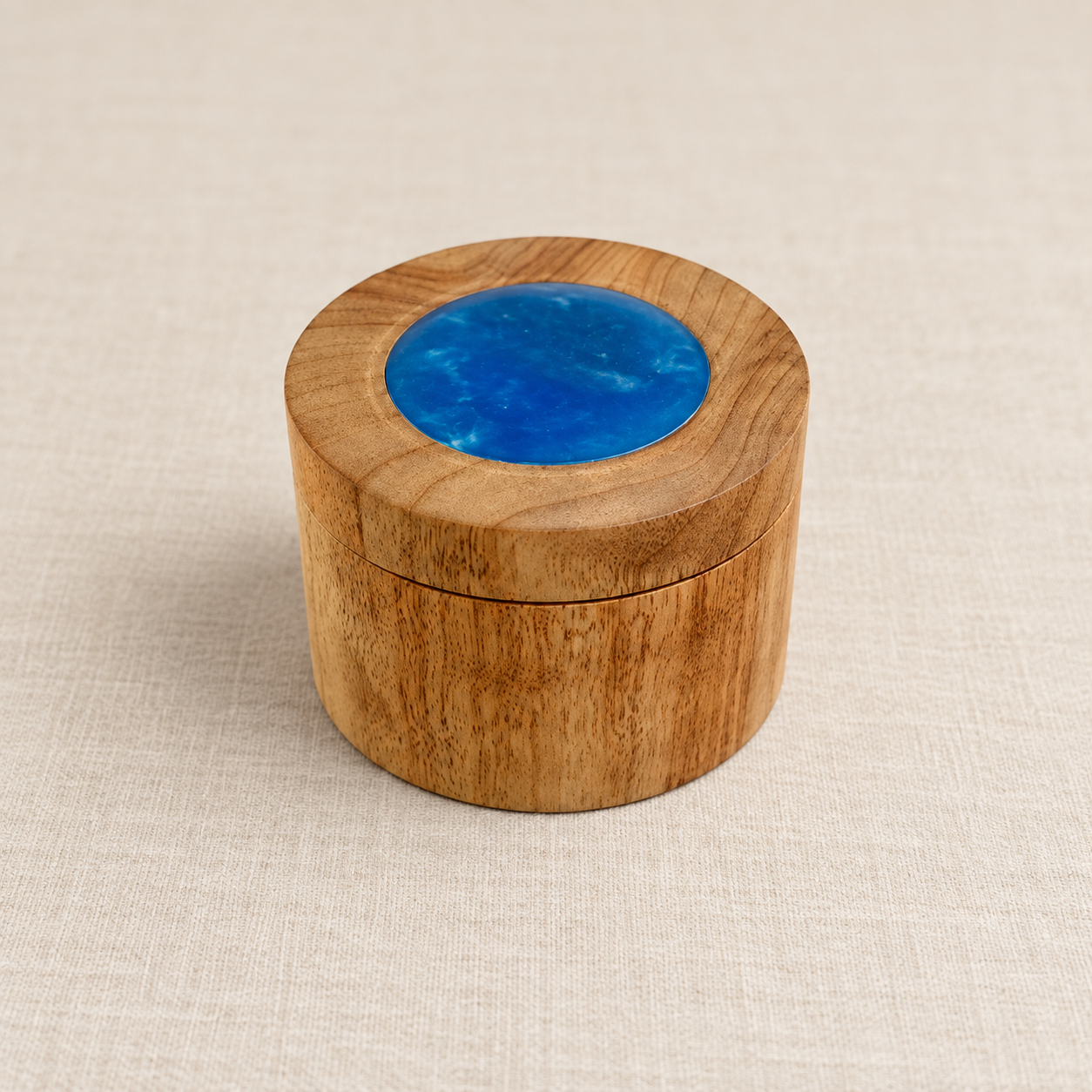 Hand-turned Camphor Laurel trinket box with blue resin lid insert