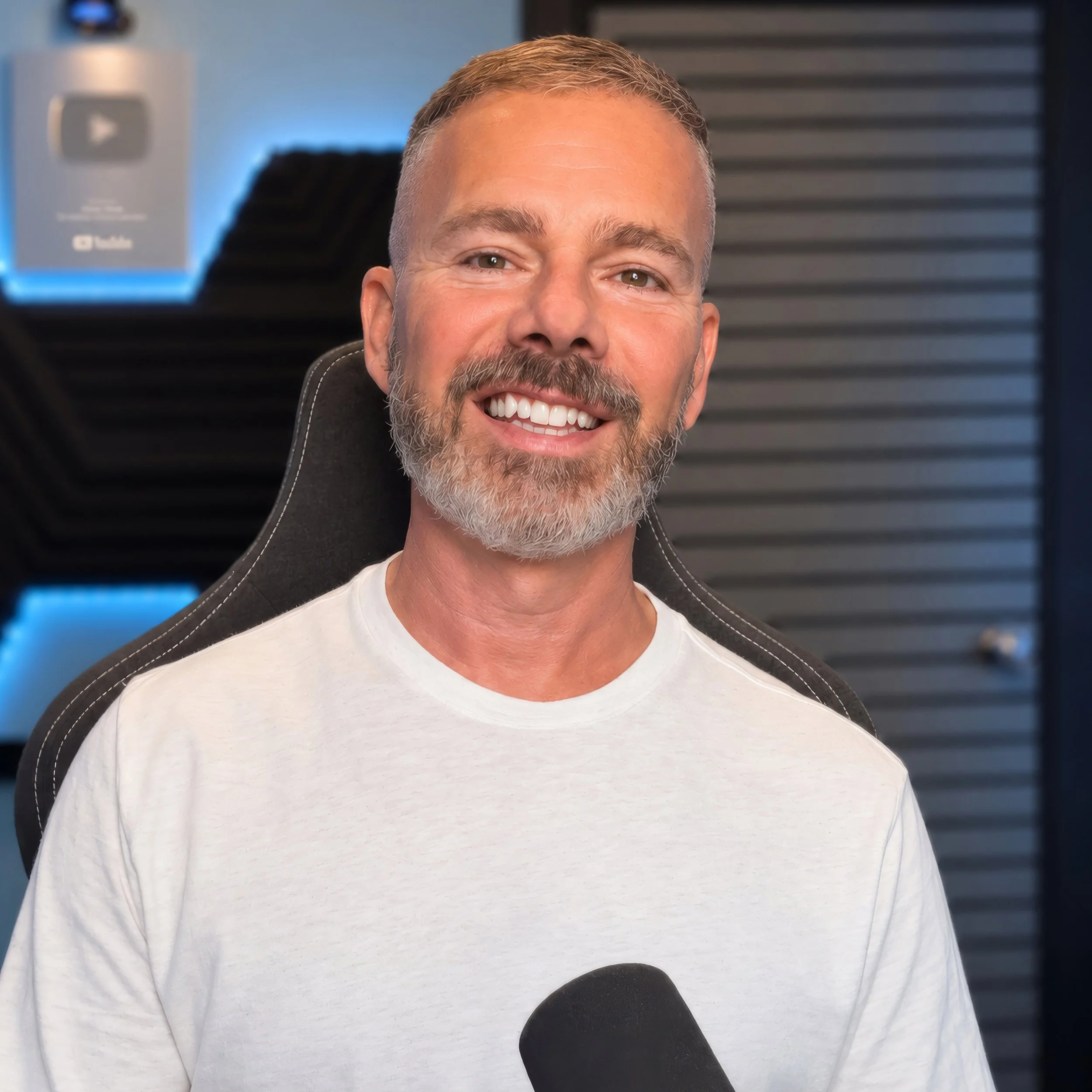 Colin Dobson-Fox in his studio, where he records interviews and discusses mental health and neurodivergence.