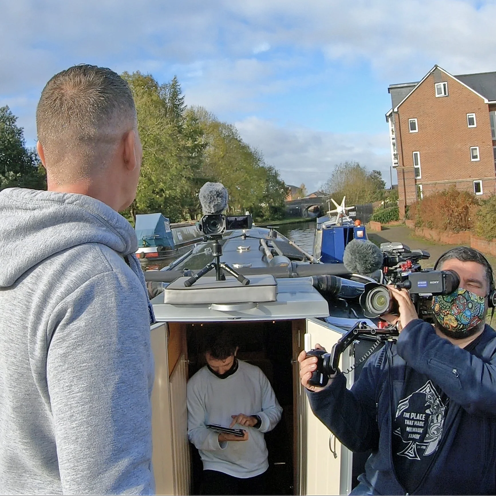 Colin Dobson-Fox being filmed on location during production of Britain by Narrowboat beside the canal.