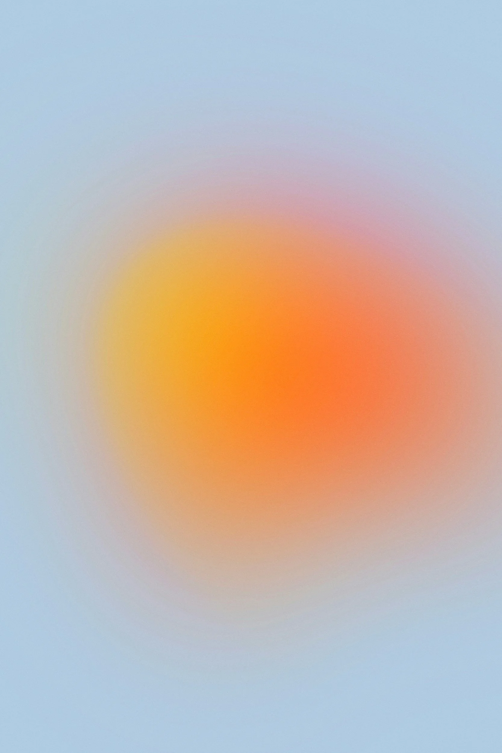 A blurred colorful gradient with shades of blue, pink, orange, and yellow.