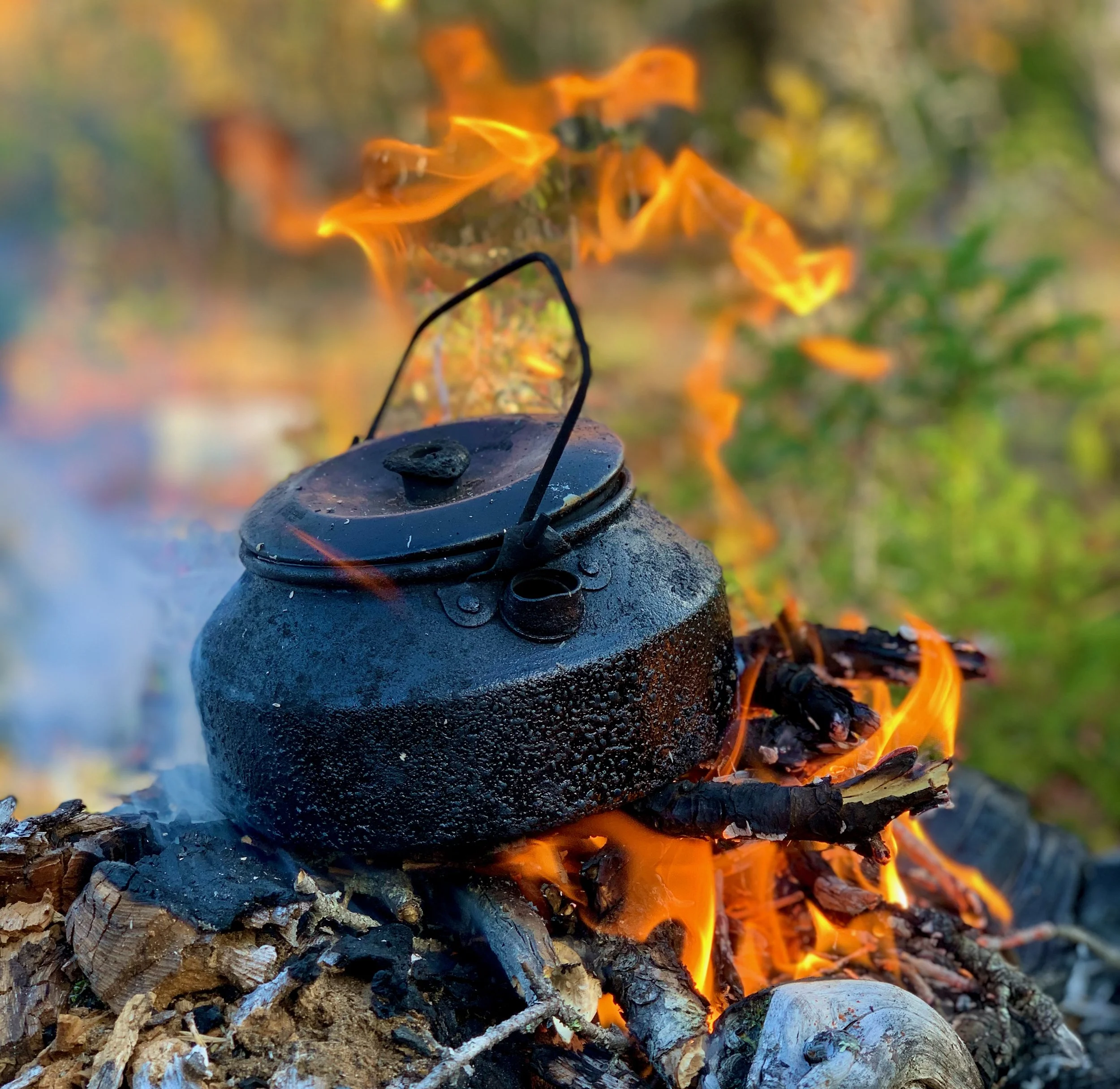 Kaffepanna över öppen eld