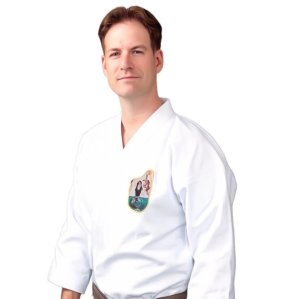 A man in a white medical uniform with a patch on the chest poses against a black background.