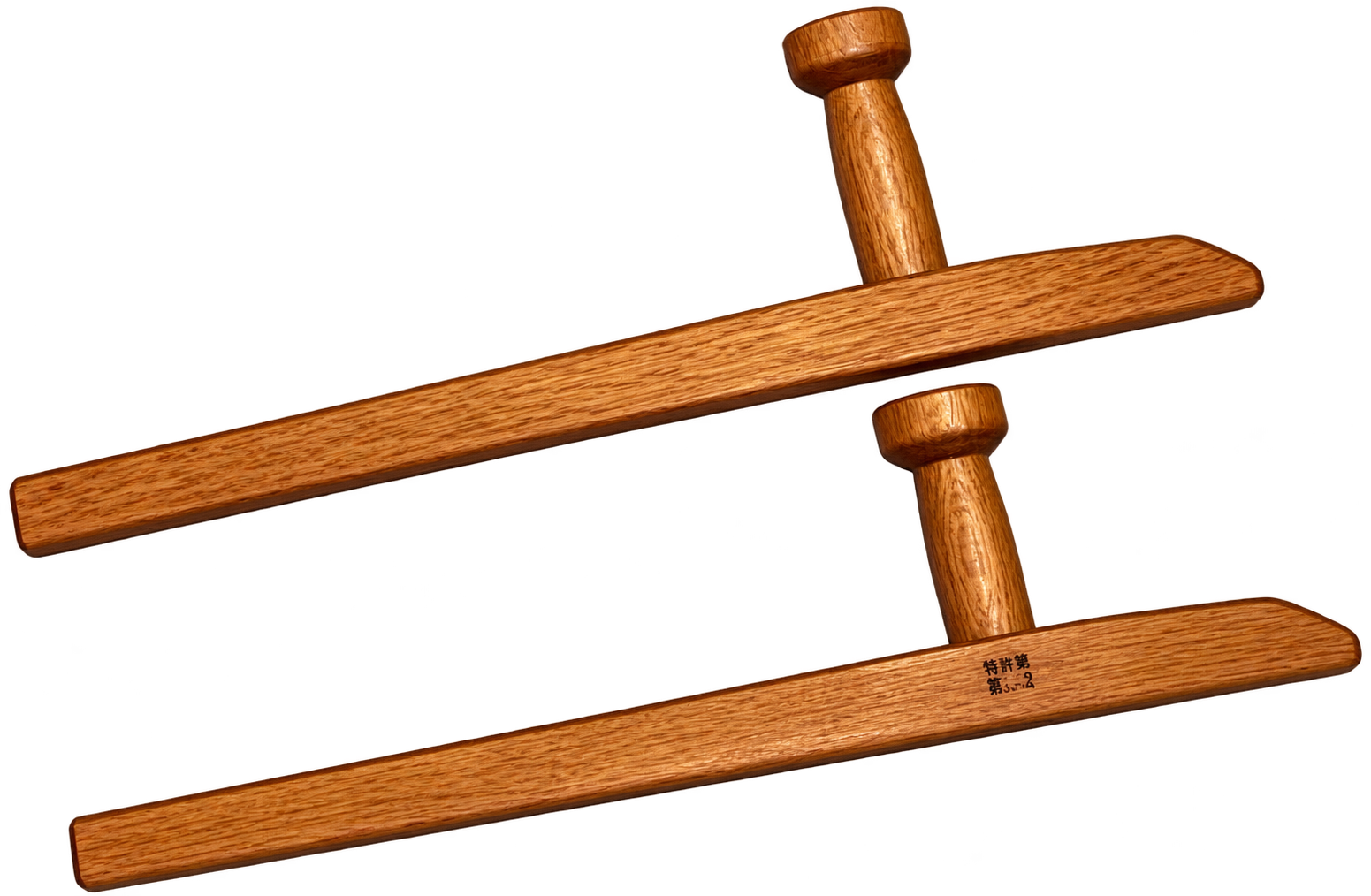 A traditional wooden hammer with a rectangular handle and two wooden heads, one on each end. One of the heads is positioned to strike, and there are Japanese characters engraved on the handle.