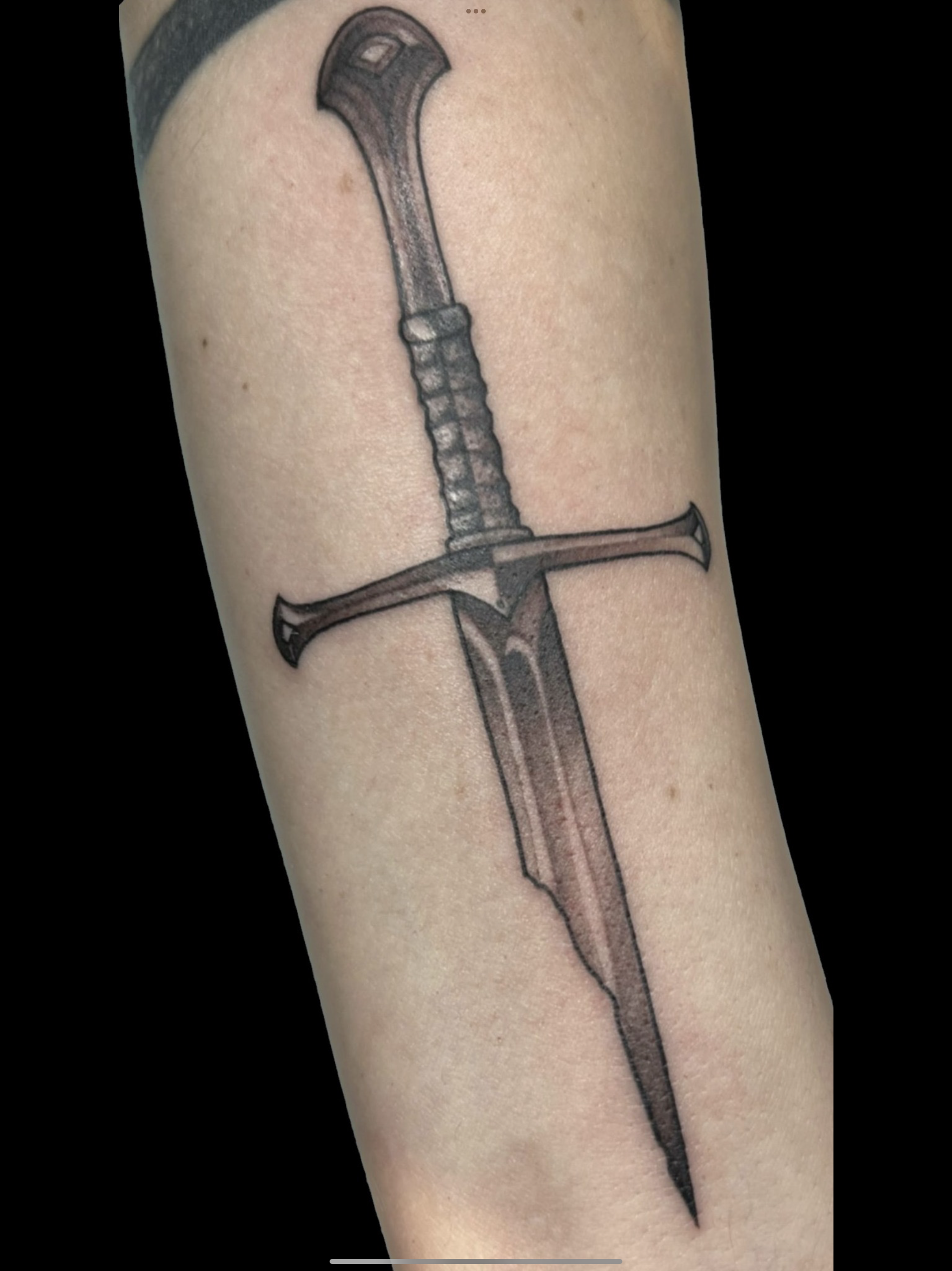 Fine line sword tattoo by Gonzalo Chavez