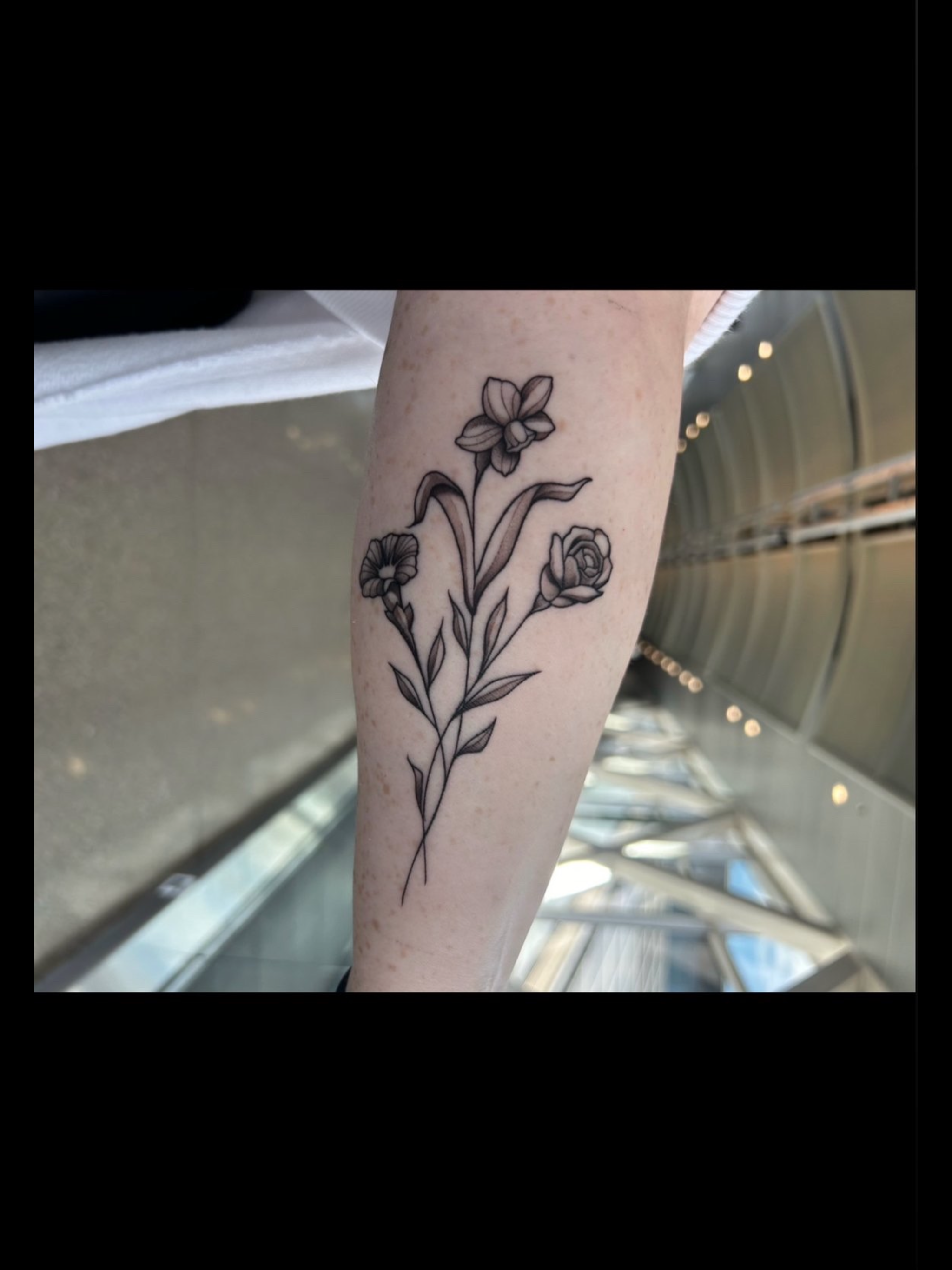 Fine line floral tattoo by Gonzalo Chavez⁠