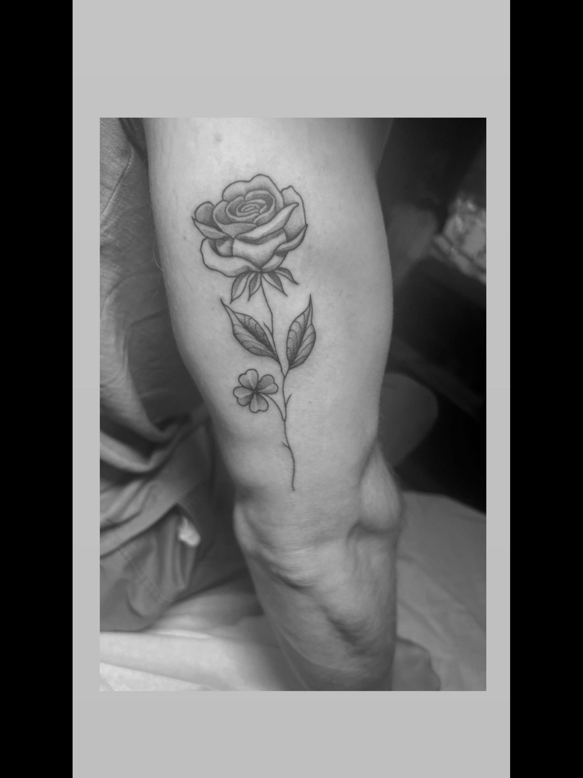 Black and grey rose tattoo by Gonzalo Chavez