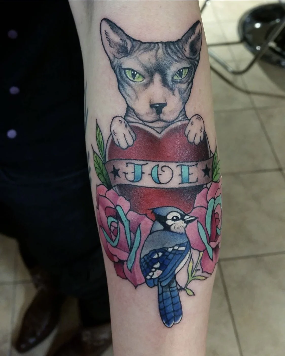 Custom cat portrait with roses tattoo by Gonzalo Chavez⁠