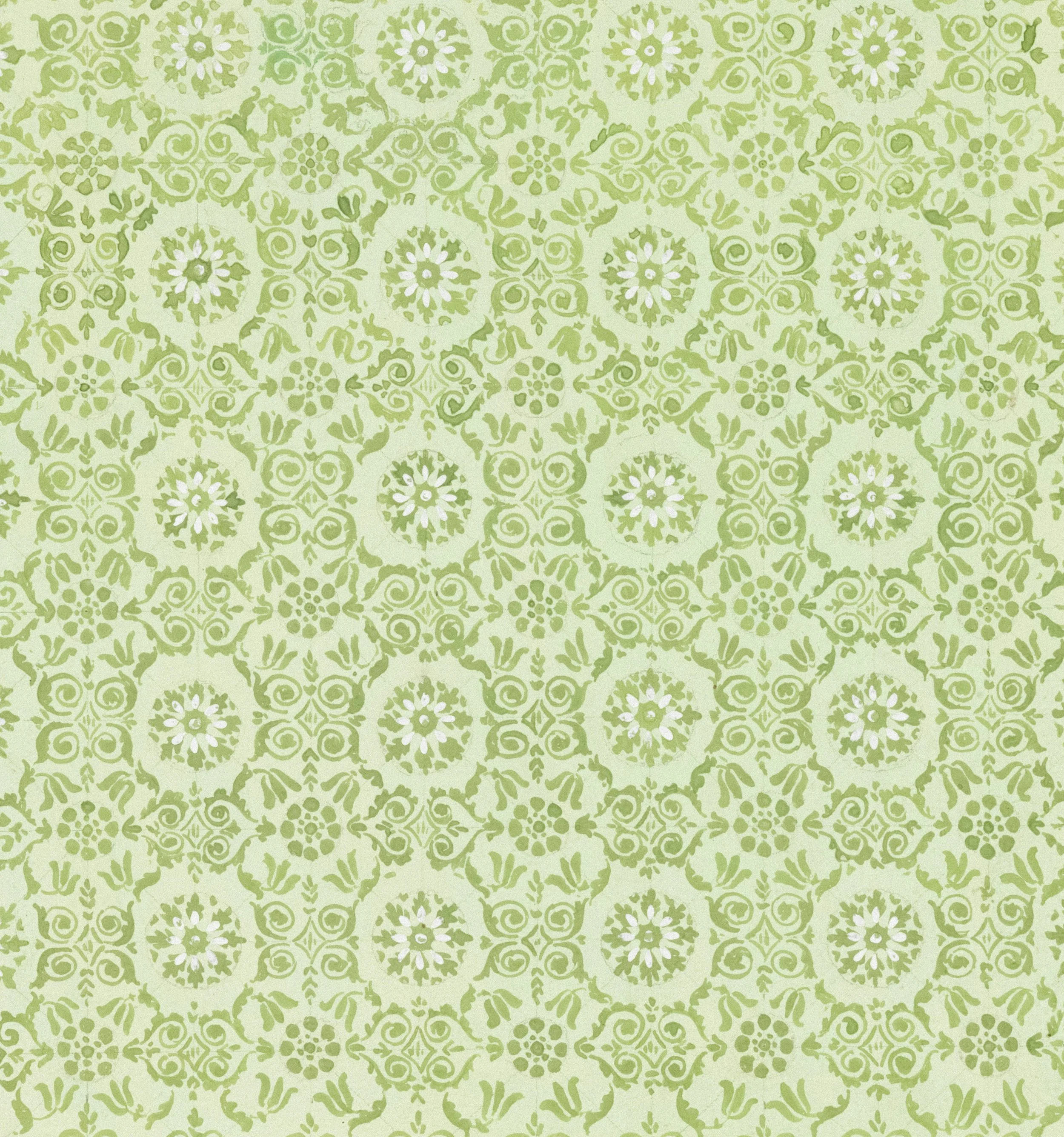 A light green patterned wallpaper with intricate floral and swirl designs repeated across the surface.