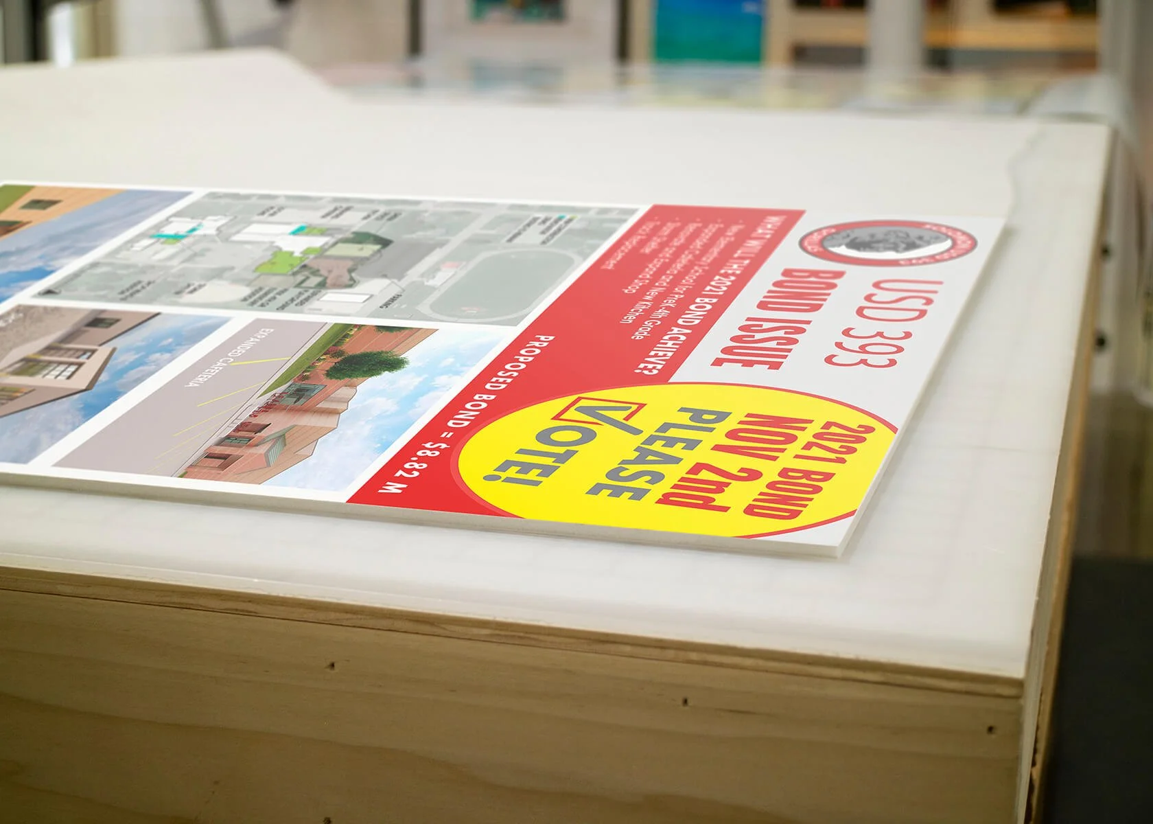 Real estate flyer offering a proposed duplex for sale at 468 W. 28th Street, Los Angeles, CA, with images of the property and property layout, placed on a white table.